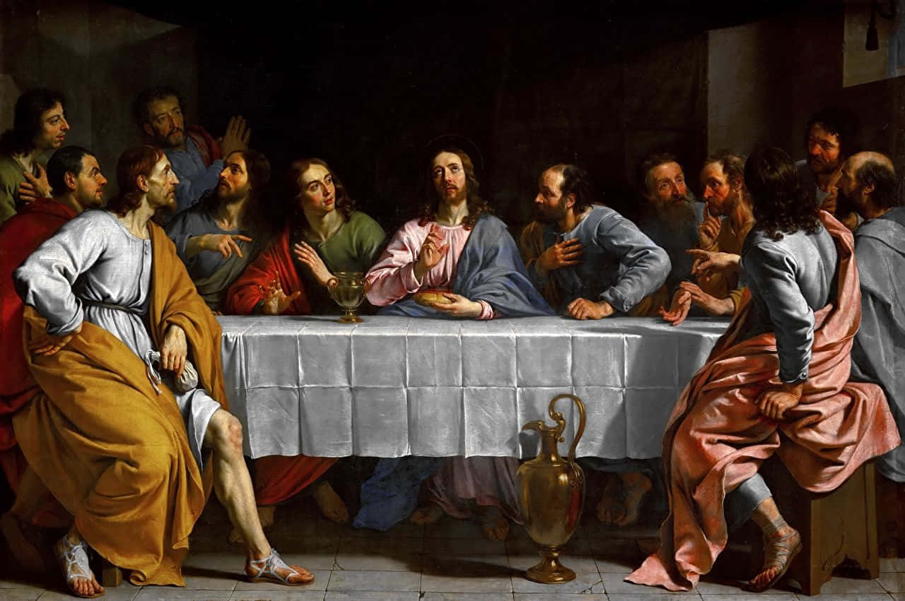 The Last Supper 桌布 壁紙 — 耶穌和門徒在最後的晚餐期間聚集在一張光線昏暗的桌子旁，帶有戲劇性的明暗對比燈光。