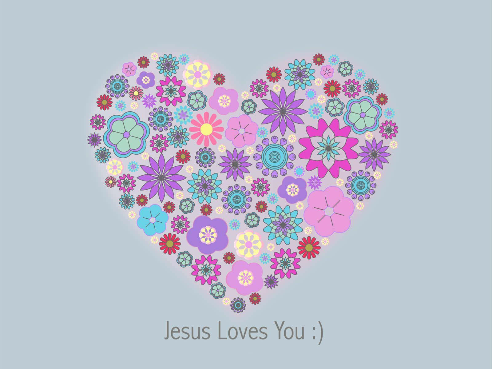 一個由彩色花朵組成的心形，帶有文字 Jesus Loves You