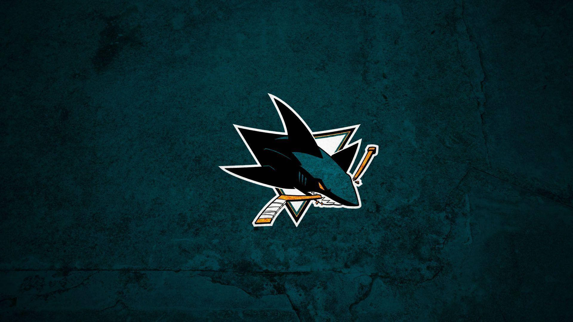 聖荷西鯊魚隊NHL標誌在帶有紋理的青色背景上