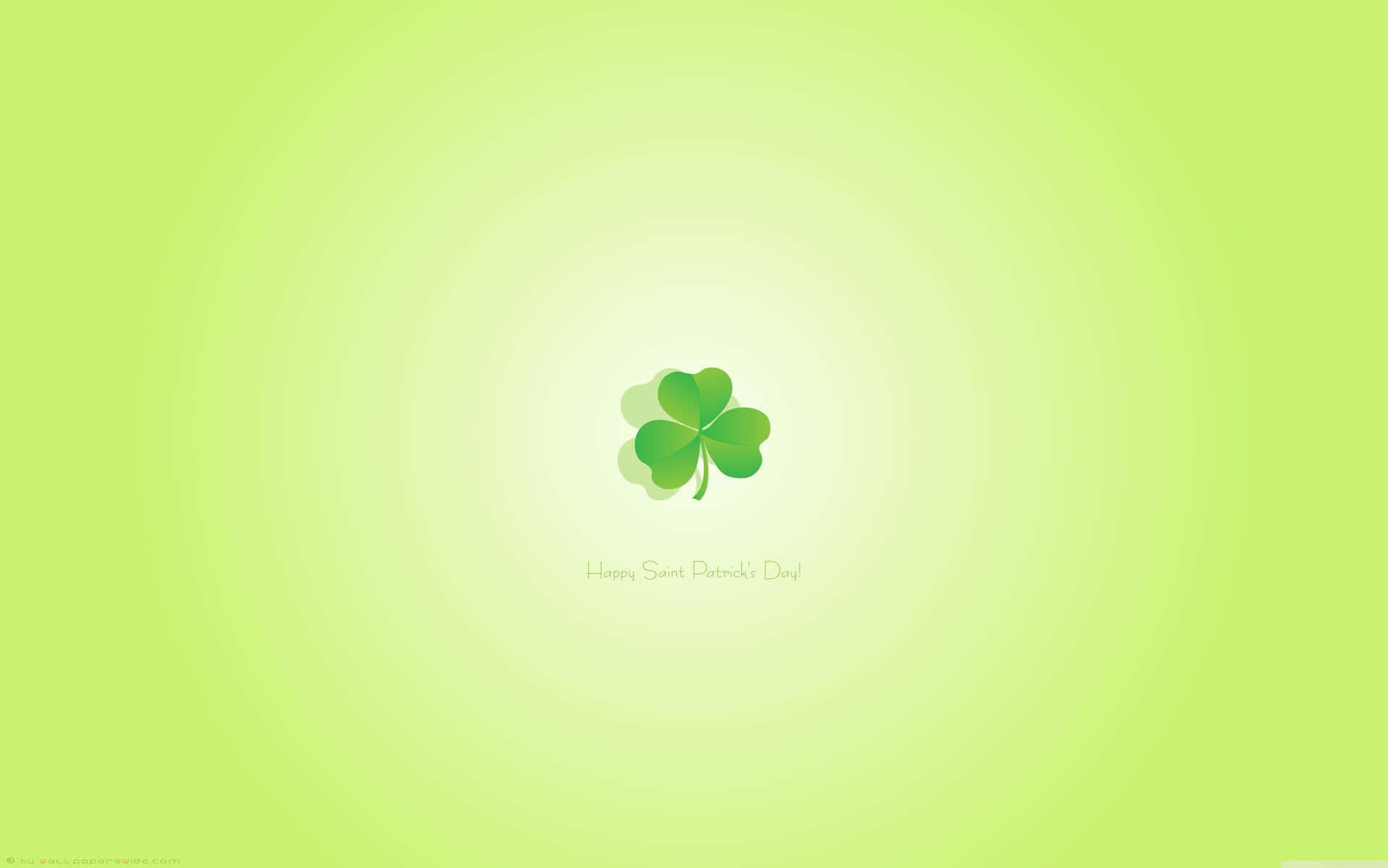 一個綠色四葉草，帶有 'Happy Saint Patrick's Day' 文字在漸變背景上。