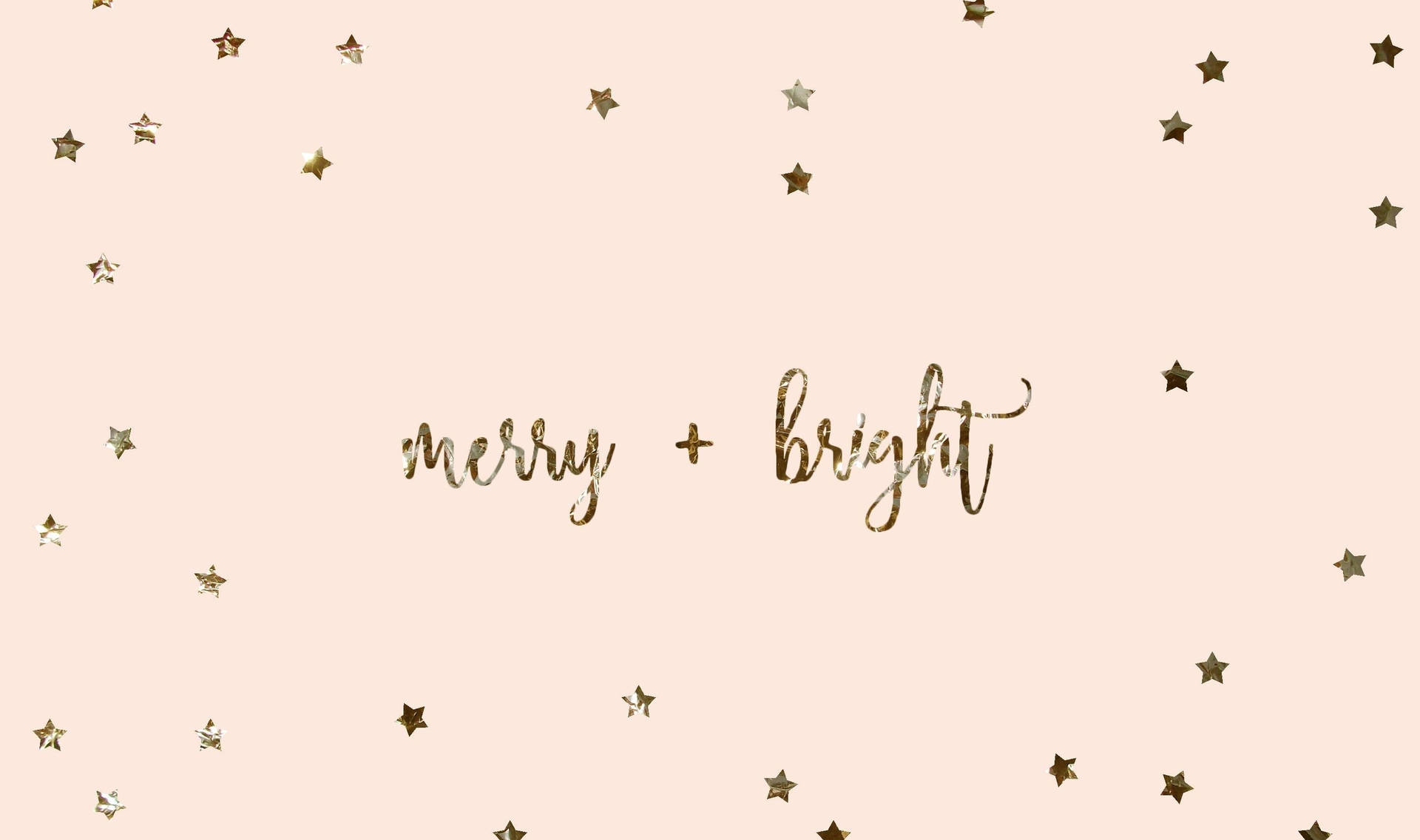 蜜桃色背景上，金色星星環繞著金色字體的 merry bright 文字。