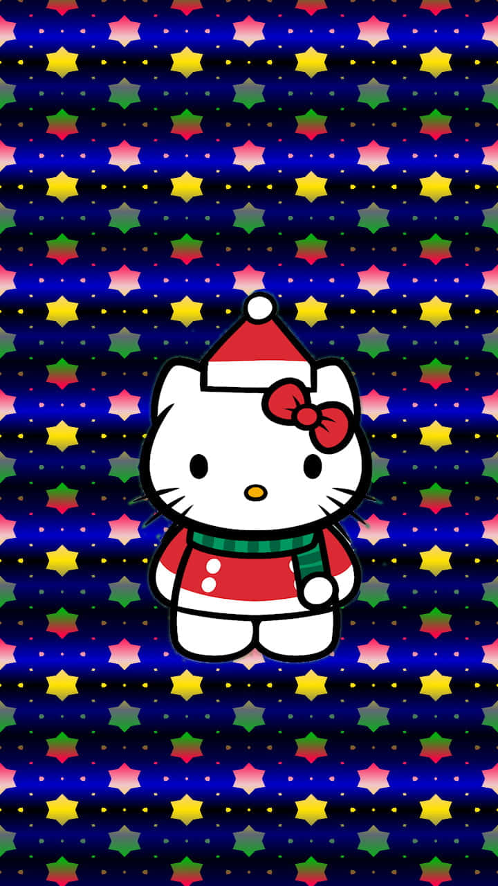 聖誕節快樂！Hello Kitty 壁紙 — Hello Kitty 戴著喜慶的紅色帽子和圍巾，站在充滿活力的星空藍色背景前，背景有色彩繽紛的幾何圖案。