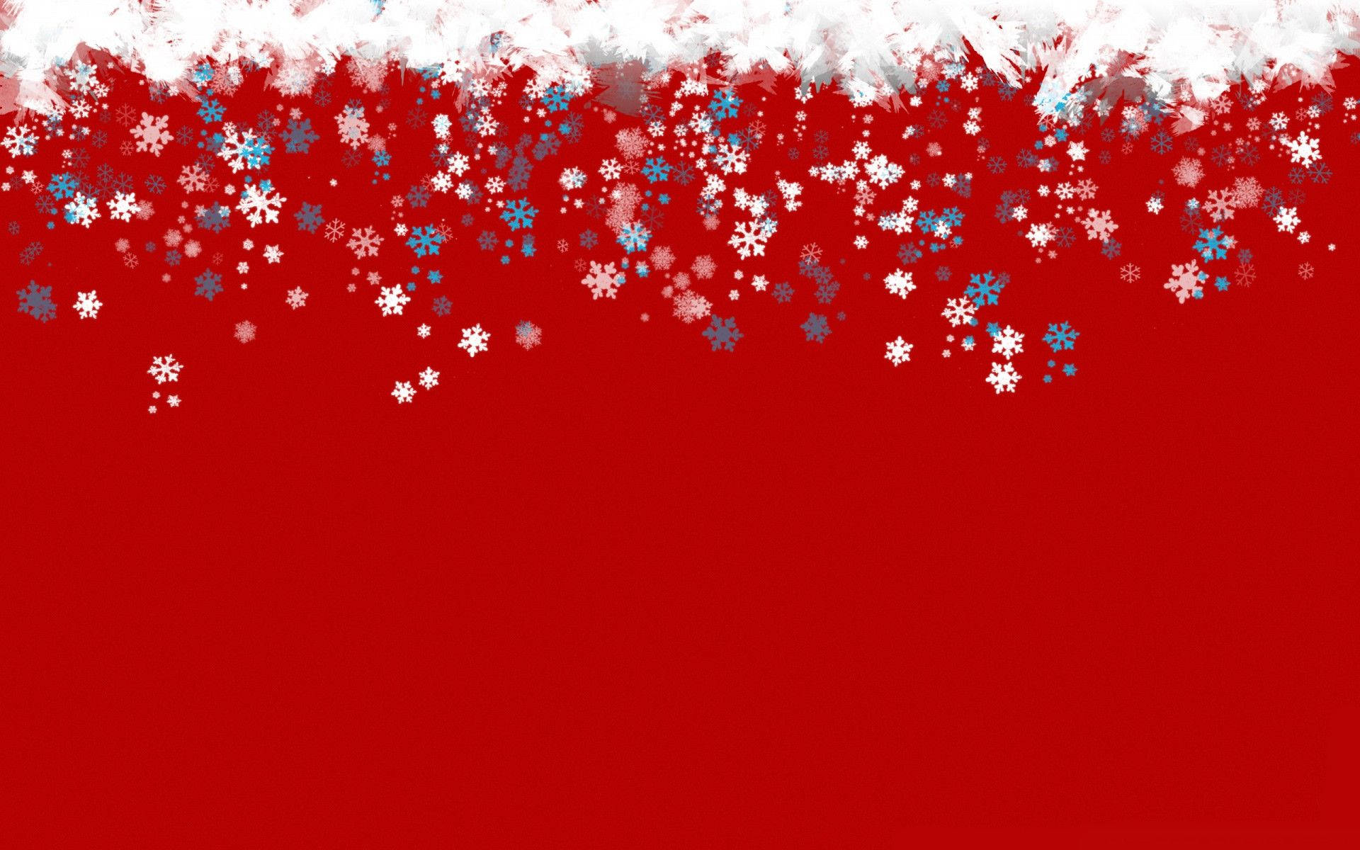 聖誕雪花背景 壁紙 — 喜慶的紅色背景，頂部有雪白邊框和飄落的白色與藍色雪花。