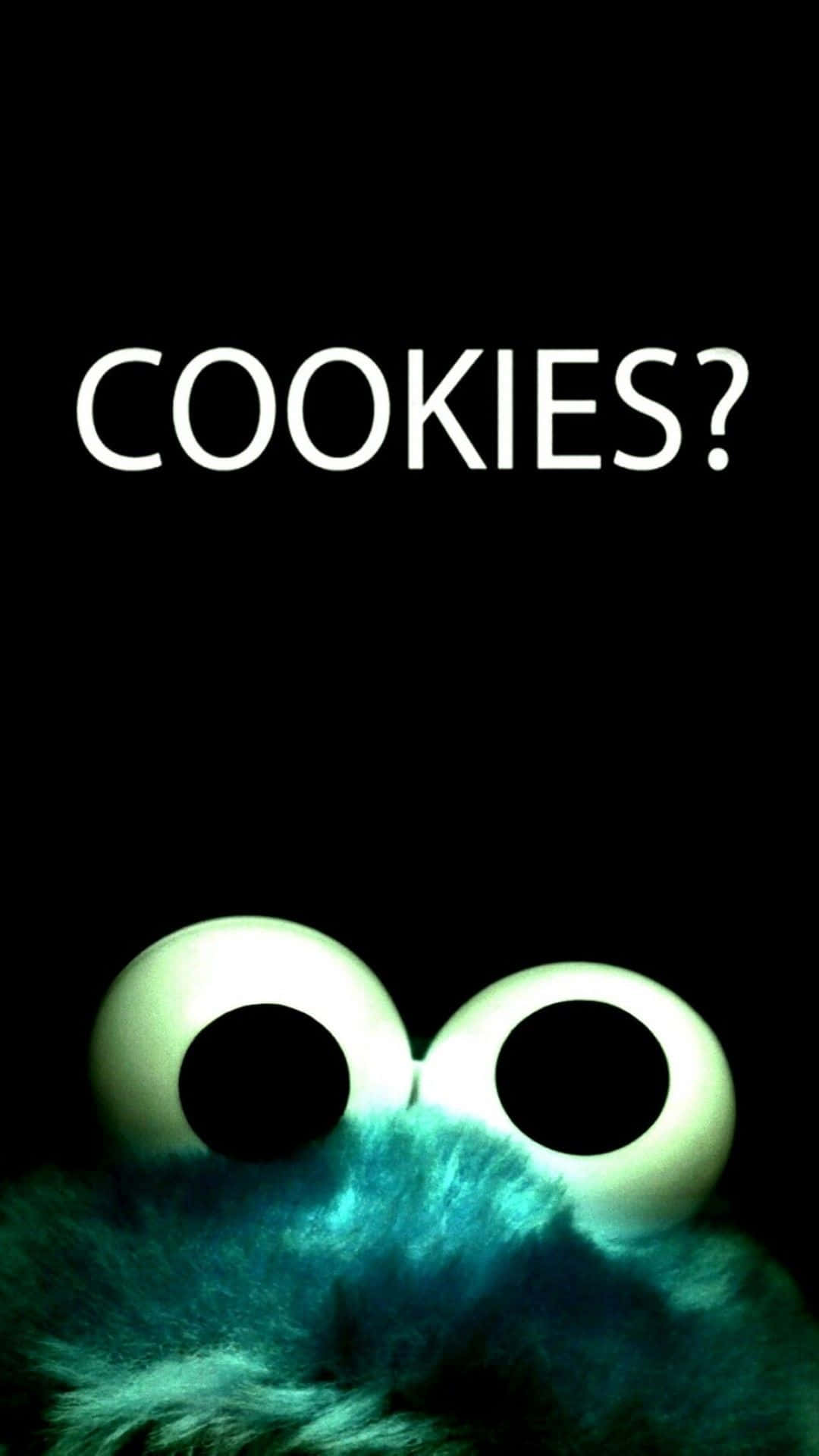 聰明iPhone餅乾怪獸 壁紙 — Cookie Monster 發光的眼睛從深藍綠色毛髮中向上望，背景為黑色，並有粗體白色文字問「COOKIES?」