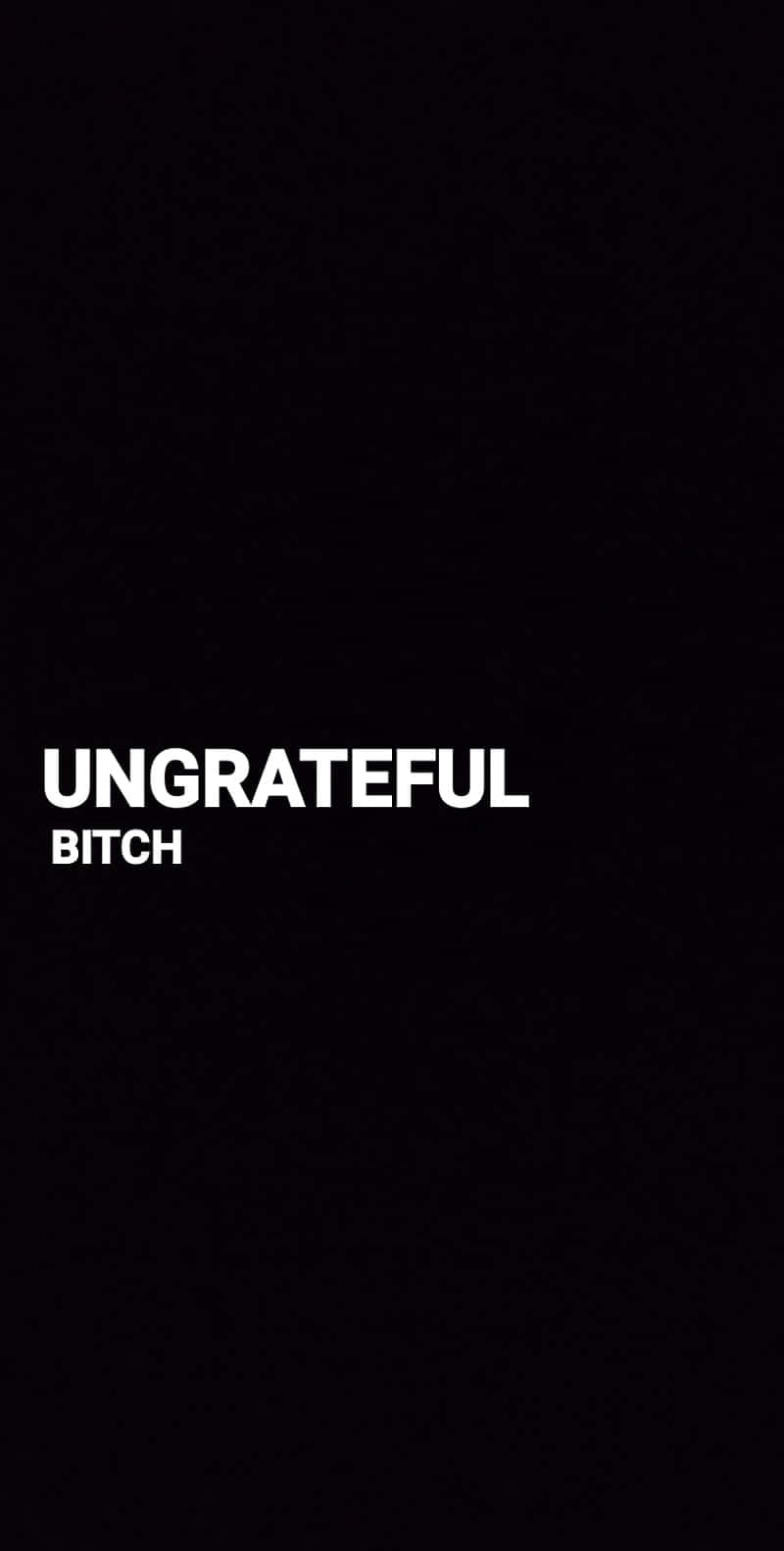 黑色背景上，粗體白色文字寫著 ungrateful bitch。
