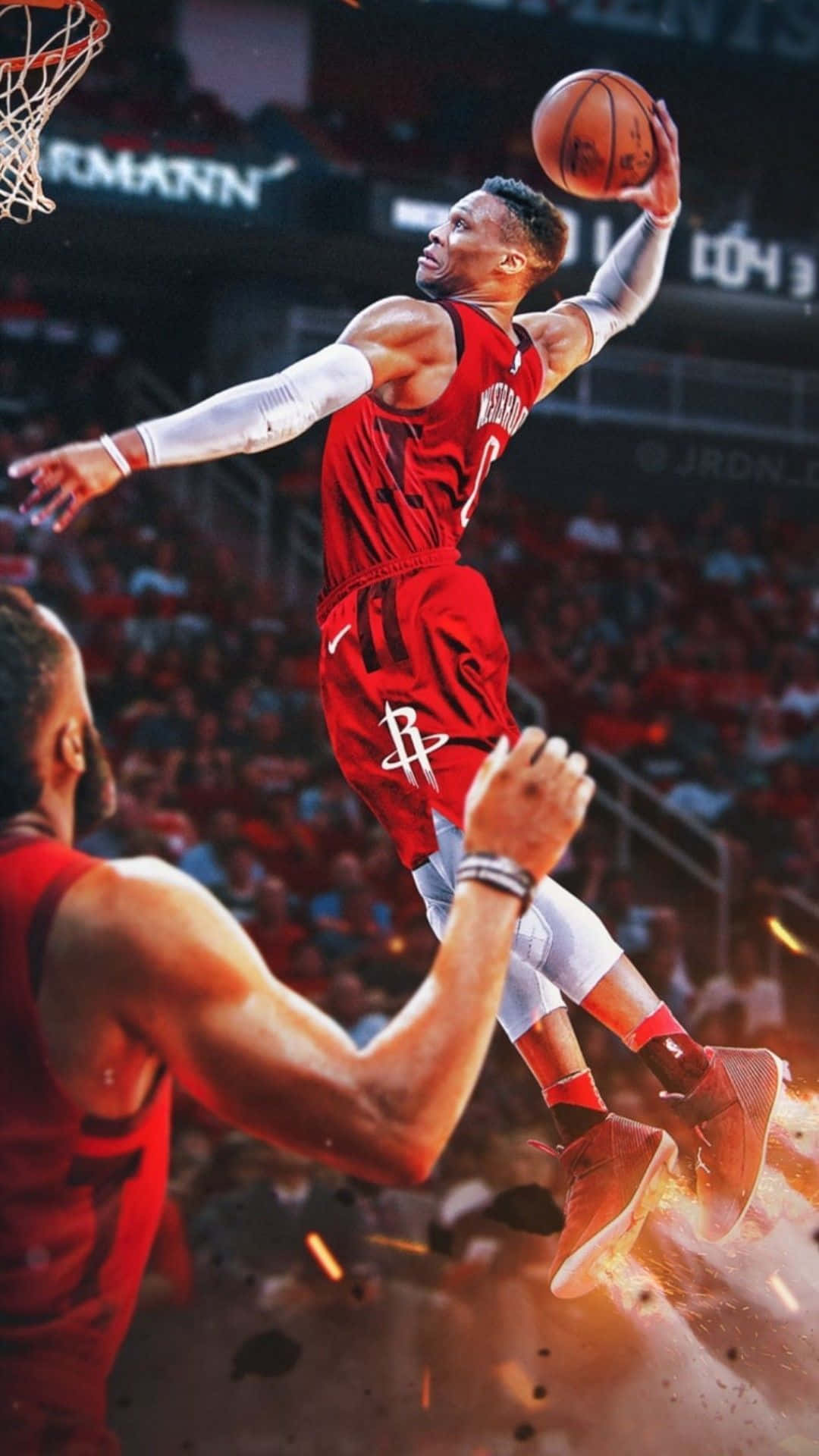 自豪地代表你最愛的NBA球隊 壁紙 — 一名身穿紅色球衣的籃球運動員動態地跳向籃框，腳下爆發出火花。