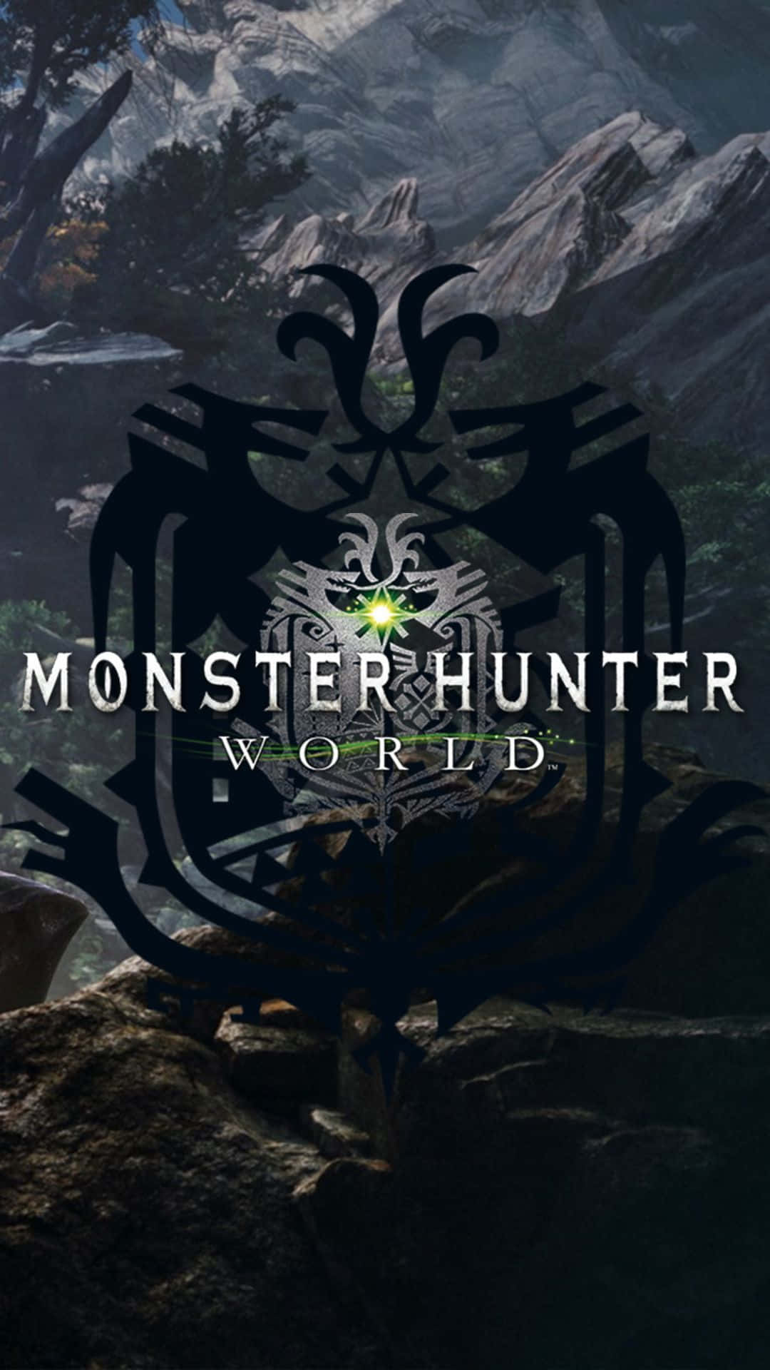 Monster Hunter World 標誌在黑暗的山地景觀中帶有發光的綠色眼睛。