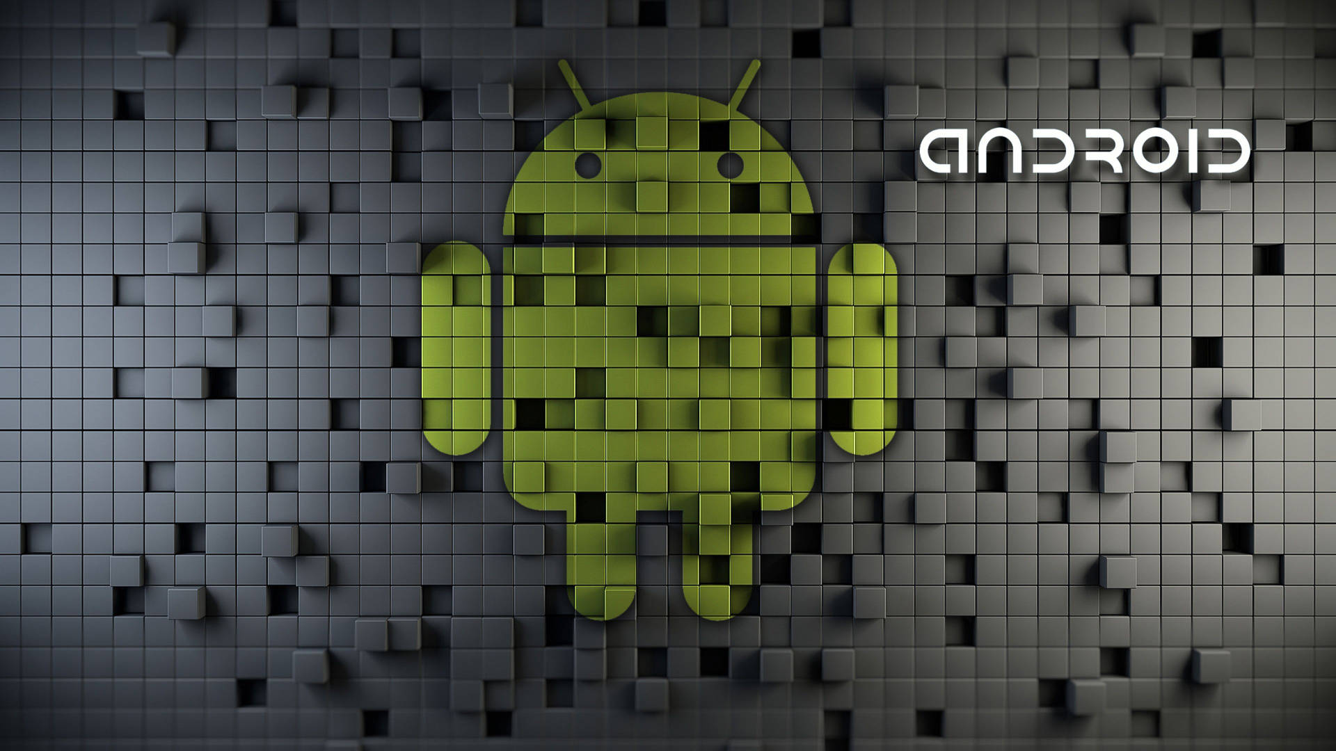 灰色紋理牆上帶有Android文字，由立方體組成的綠色Android吉祥物。