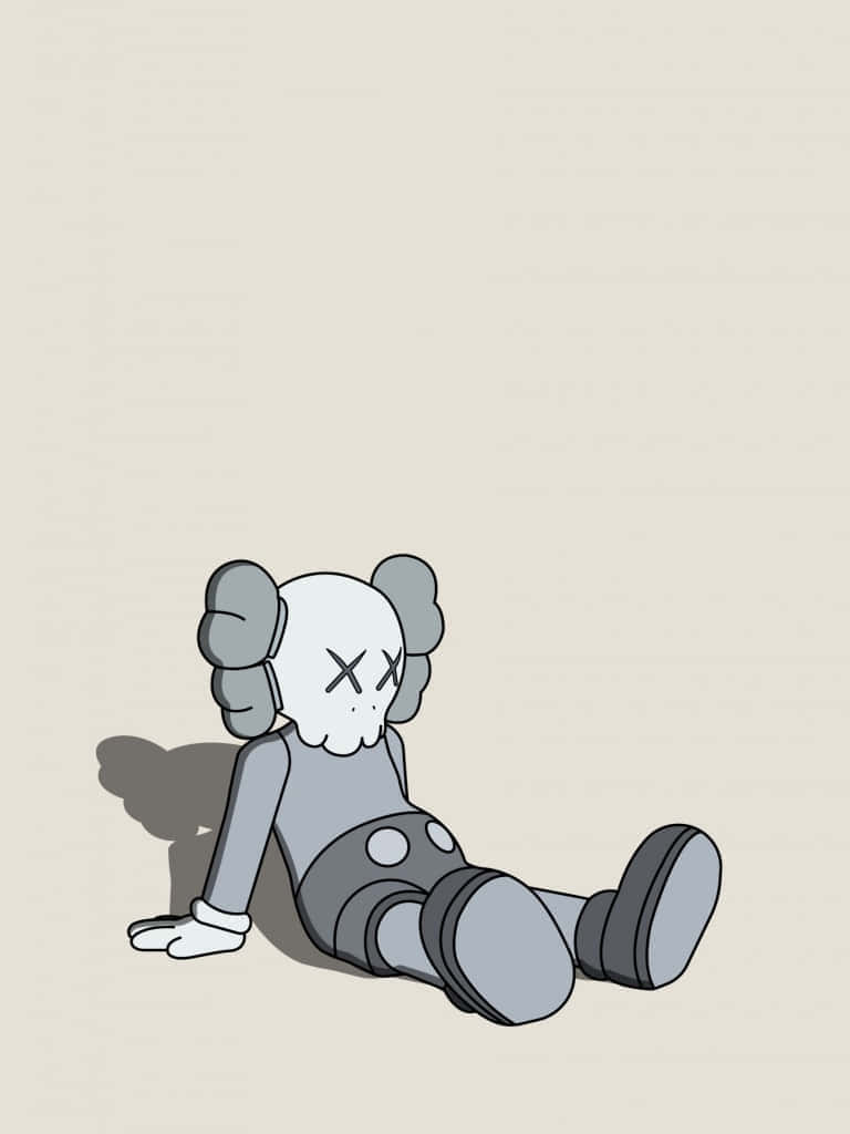 與 KAWS 一起感受愉悅氛圍 壁紙 — 一個灰色卡通人物，眼睛呈X形，癱坐在純米色背景上，投下柔和陰影。