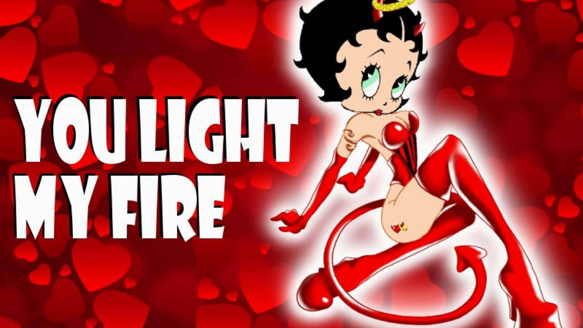 Betty Boop 穿著魔鬼服裝，配上紅色心形和文字「你點燃了我的火」。