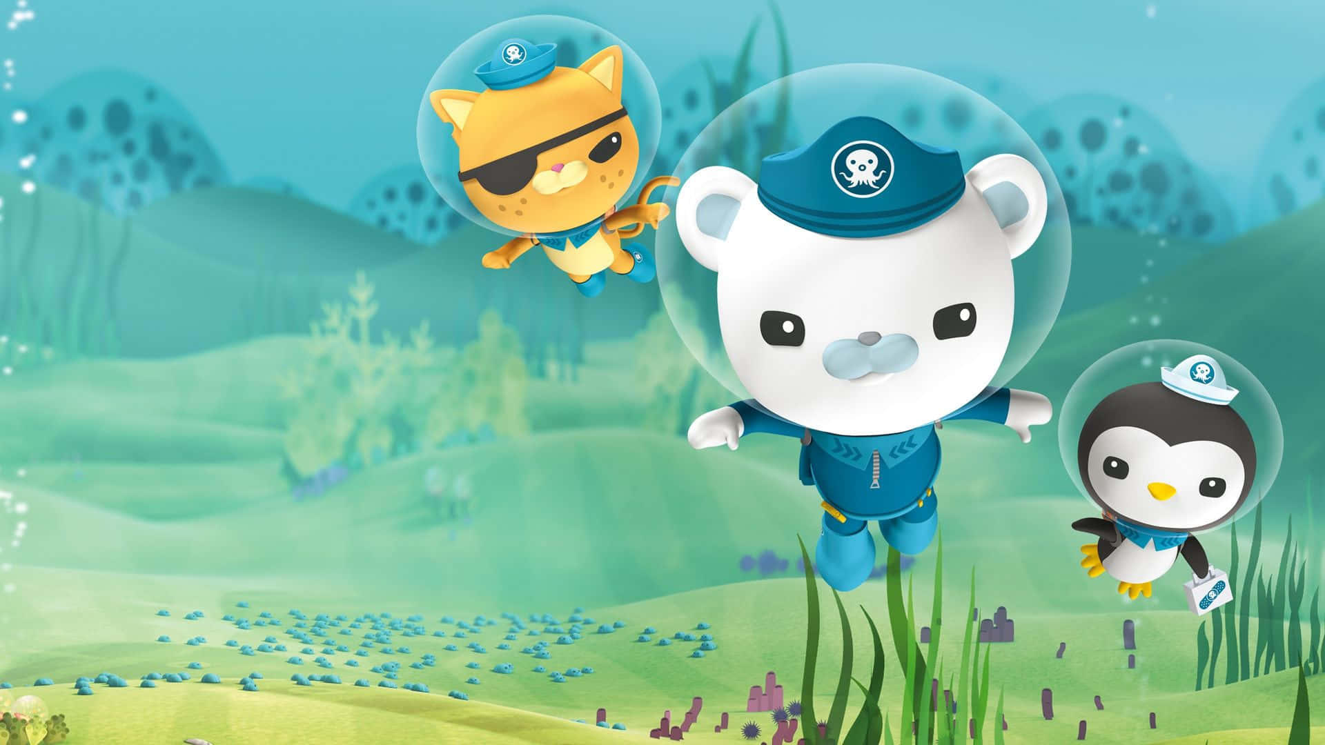 三個卡通海洋動物穿著潛水服探索有綠色山丘和珊瑚的海底世界。
