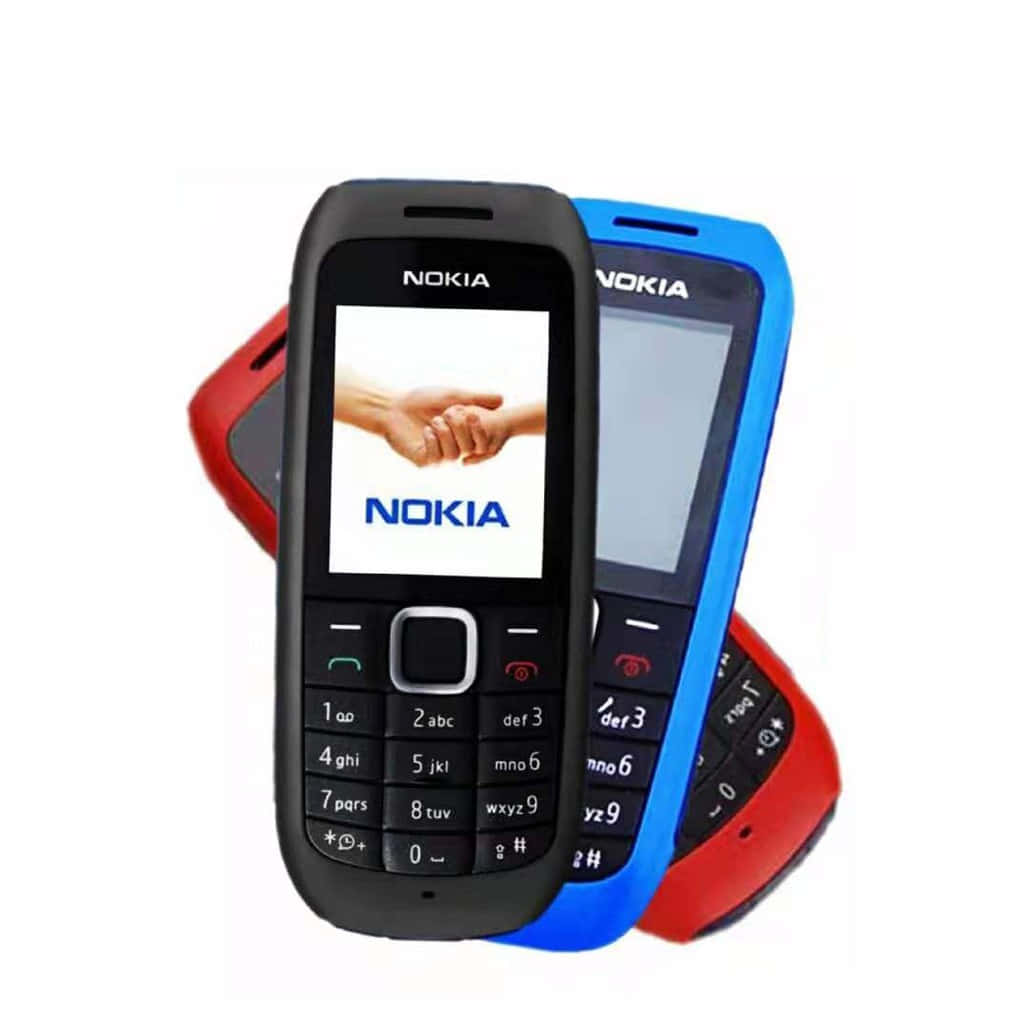 三部Nokia手機，紅色、藍色和黑色，帶握手屏幕