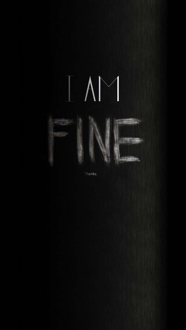喺深色表面上用粉筆寫嘅「I AM FINE」同「Thanks.」文字。