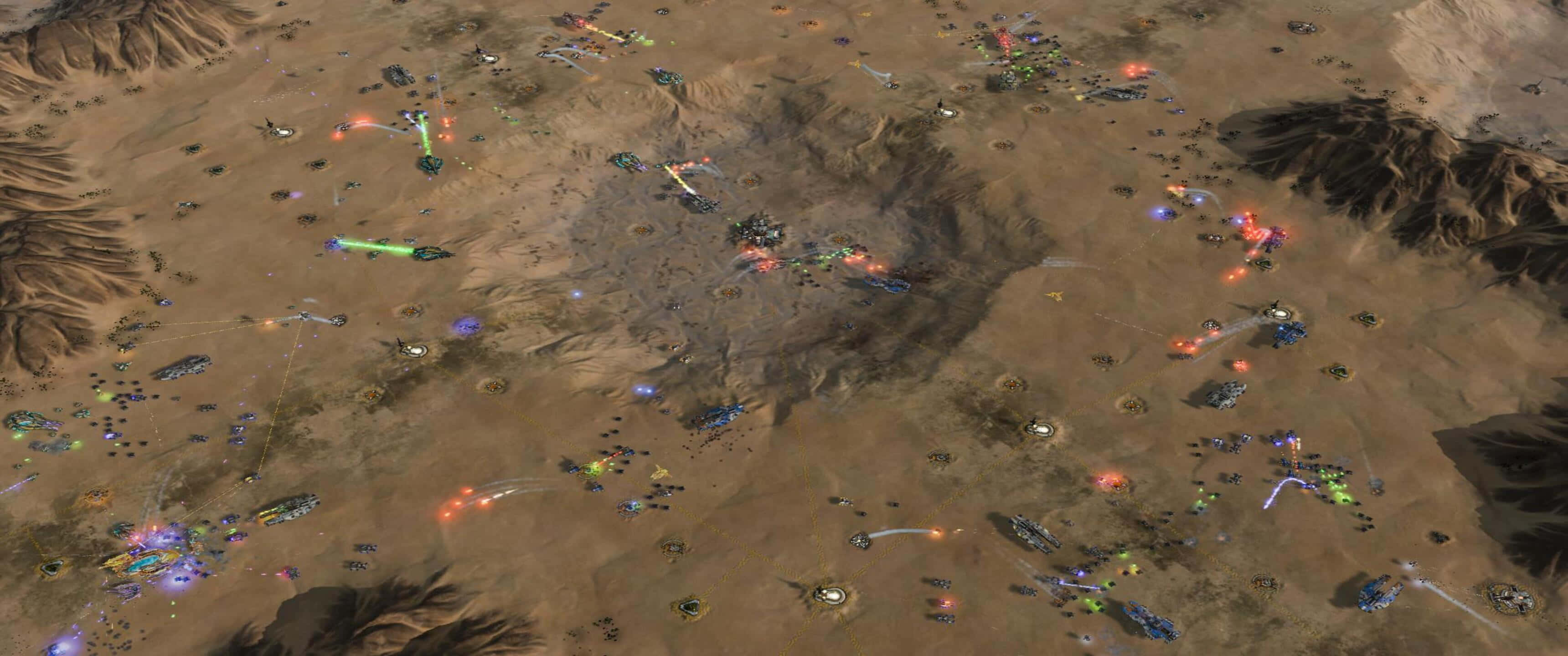 與朋友組隊探索《Ashes of the Singularity Escalation》的粗獷科幻世界 壁紙 — 沙漠戰場的鳥瞰圖，發光的能量武器和爆炸照亮了乾旱的地形。