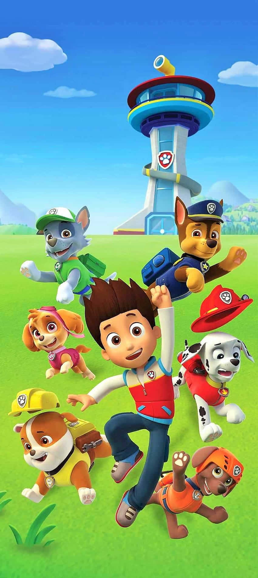 Paw Patrol 角色在塔附近的草地上奔跑 — 汪汪隊 壁紙
