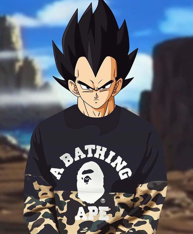 與經典《龍珠Z》系列一同踏上冒險之旅 壁紙 — 動漫角色比達（Vegeta）穿著黑色和迷彩A BATHING APE衛衣，在岩石戶外背景下帶著兇猛的表情站立。