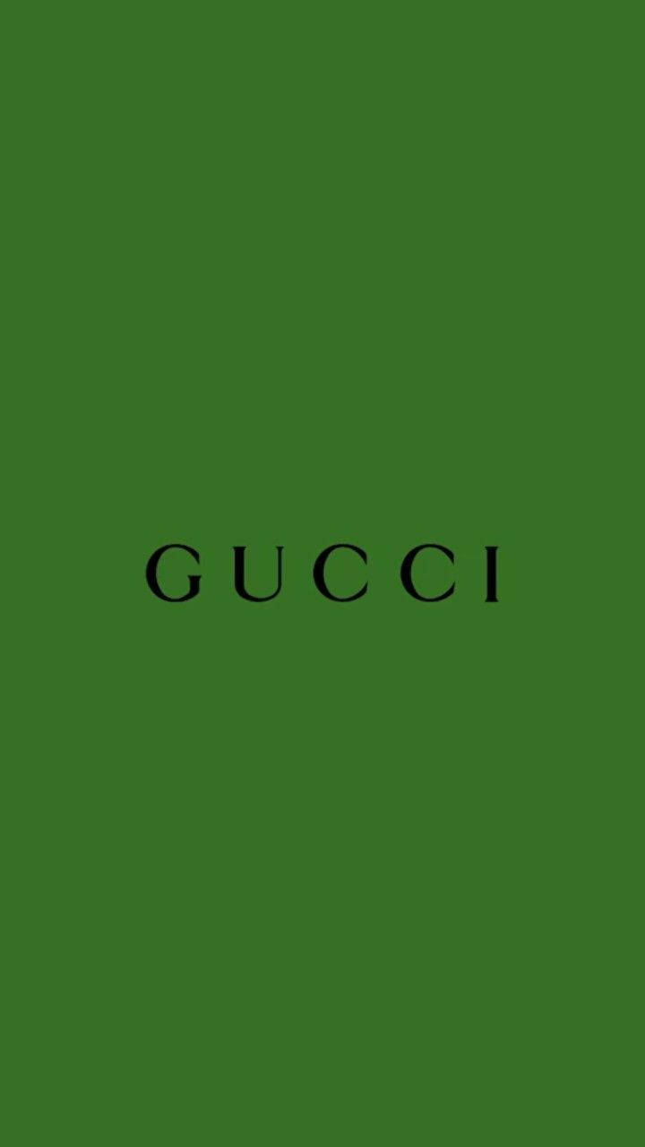 綠色背景上的黑色 Gucci 標誌