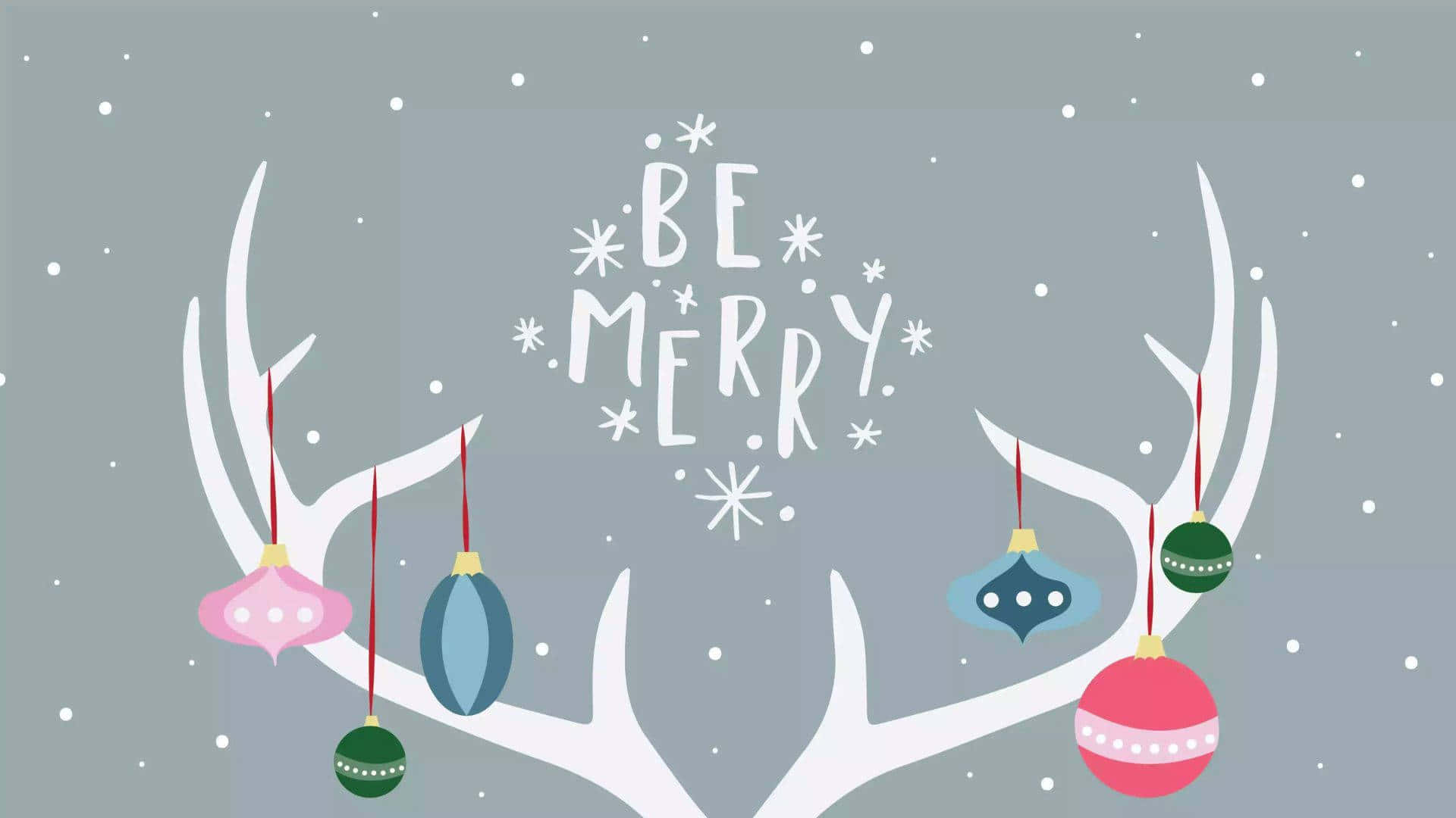節日鹿角裝飾著色彩繽紛的飾物和雪花，並帶有 be merry 文字。