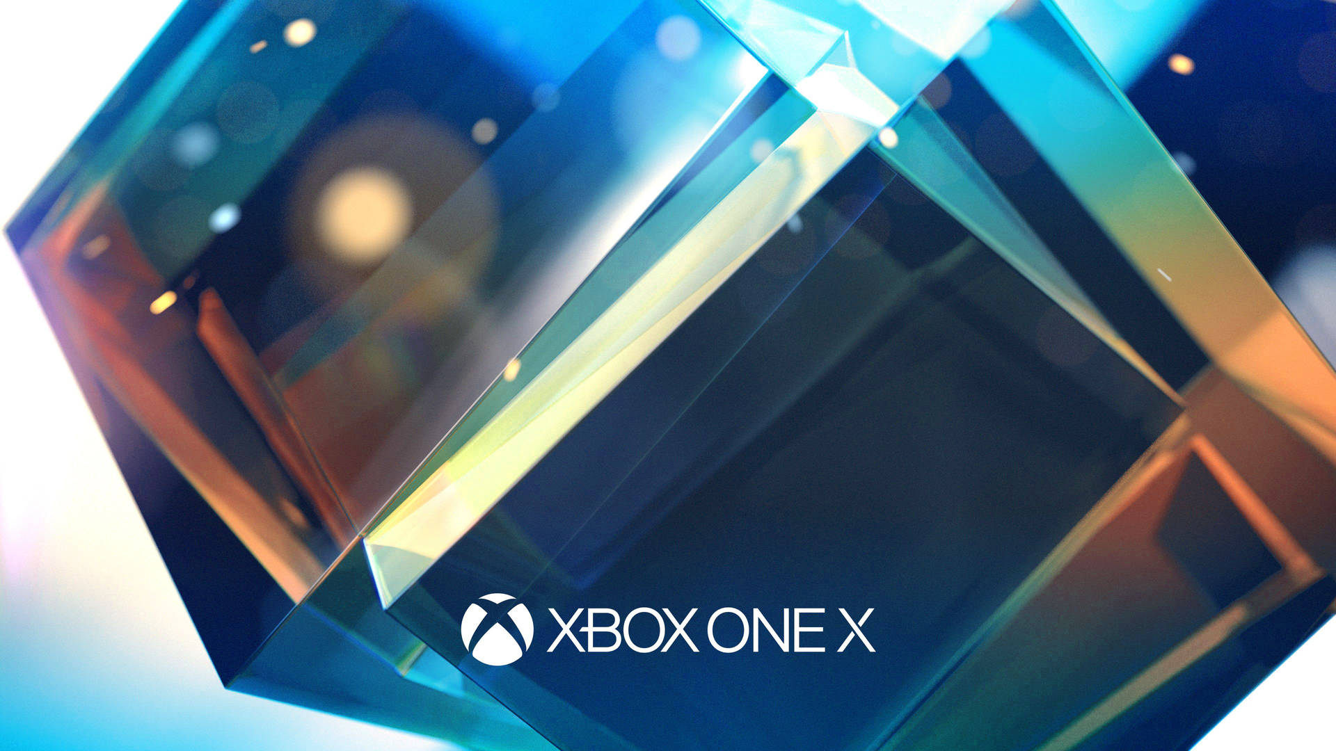 閃亮的幾何水晶，Xbox One X 標誌閃爍著藍色和金色光芒。