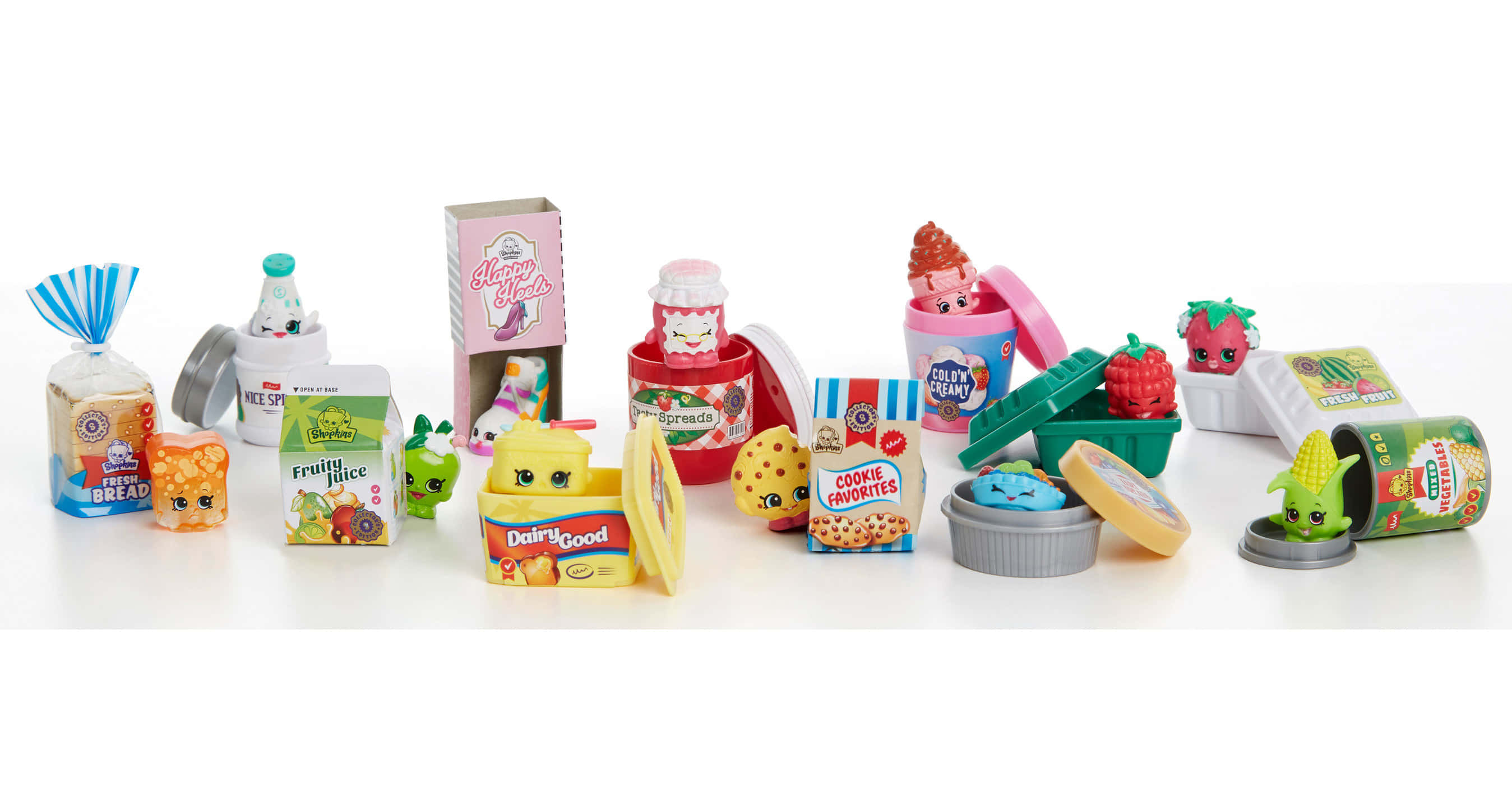Shopkins 桌布 壁紙 — 色彩繽紛的Shopkins玩具食物系列整齊排列在白色表面上。