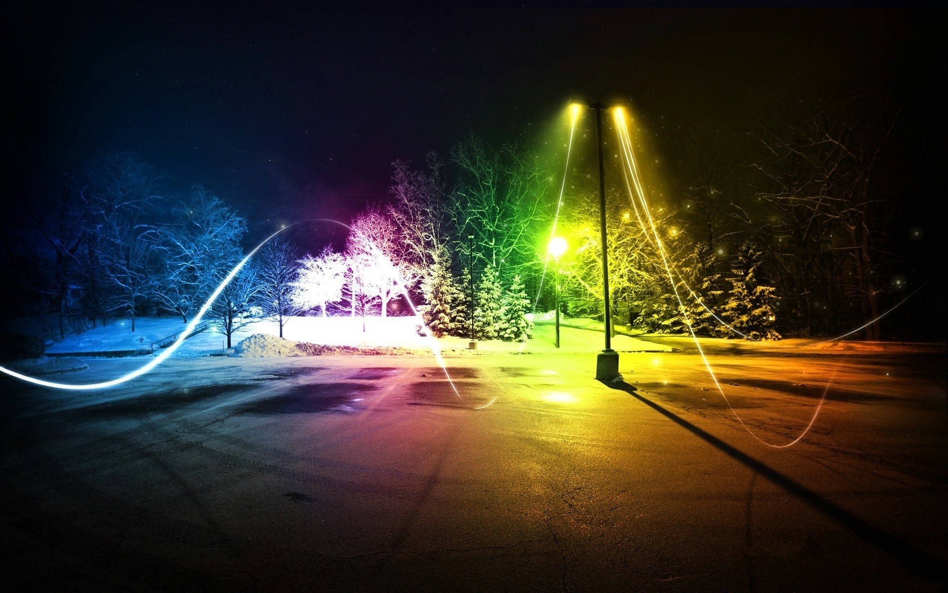 色彩繽紛的光軌在夜晚的雪街上，在光禿的樹木和路燈下盤旋。