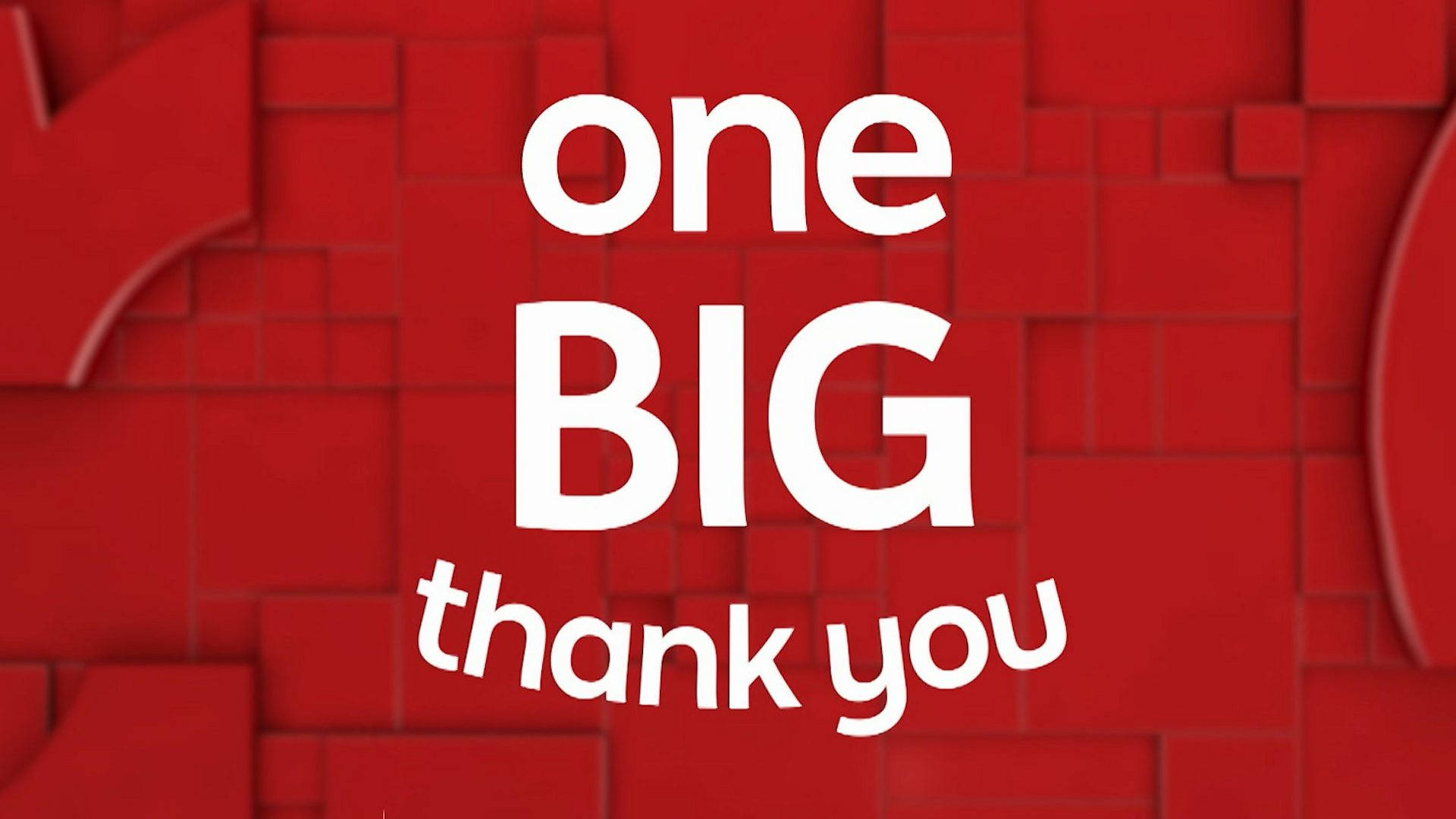 紅磚牆上寫有粗體白色文字「one BIG thank you」。