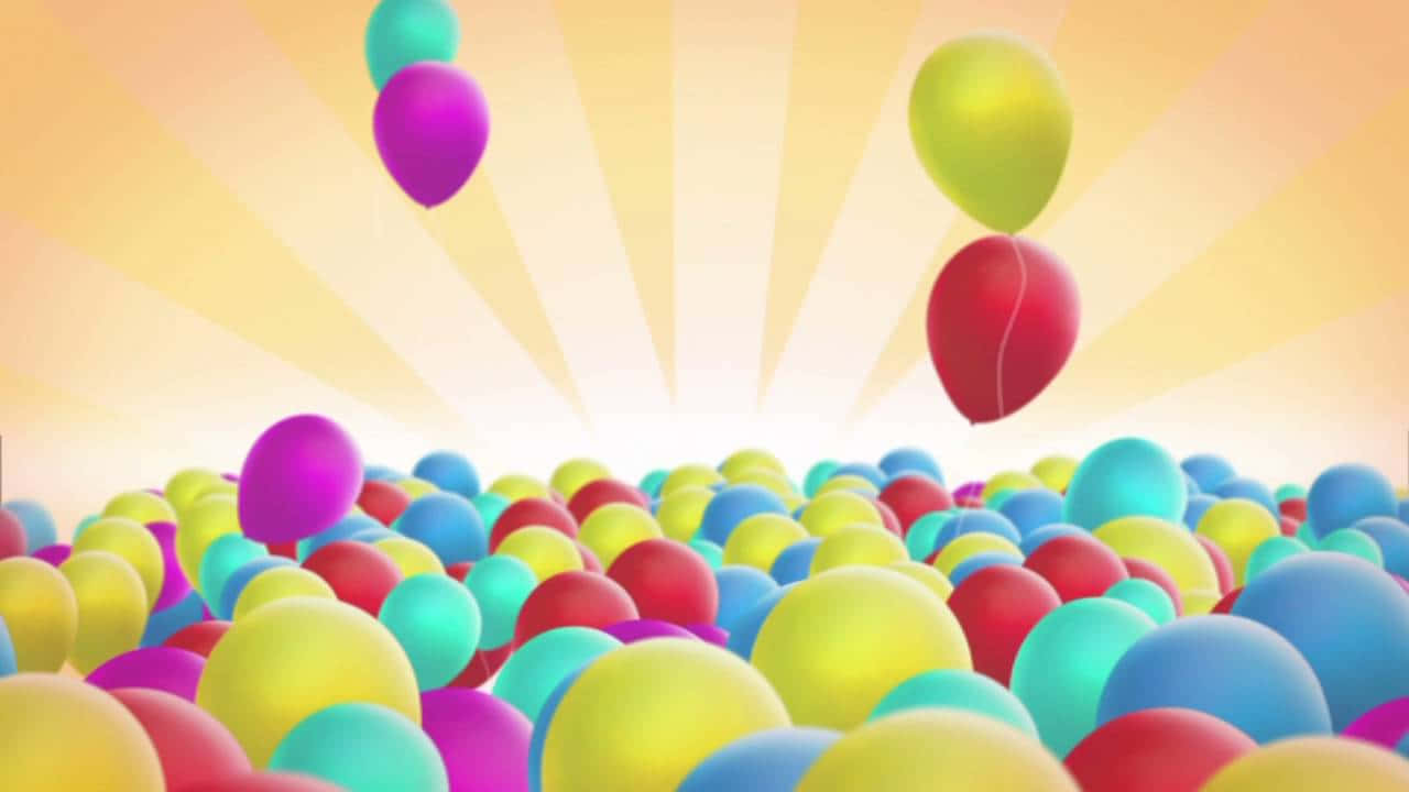 色彩繽紛的氣球在空中飛翔 壁紙