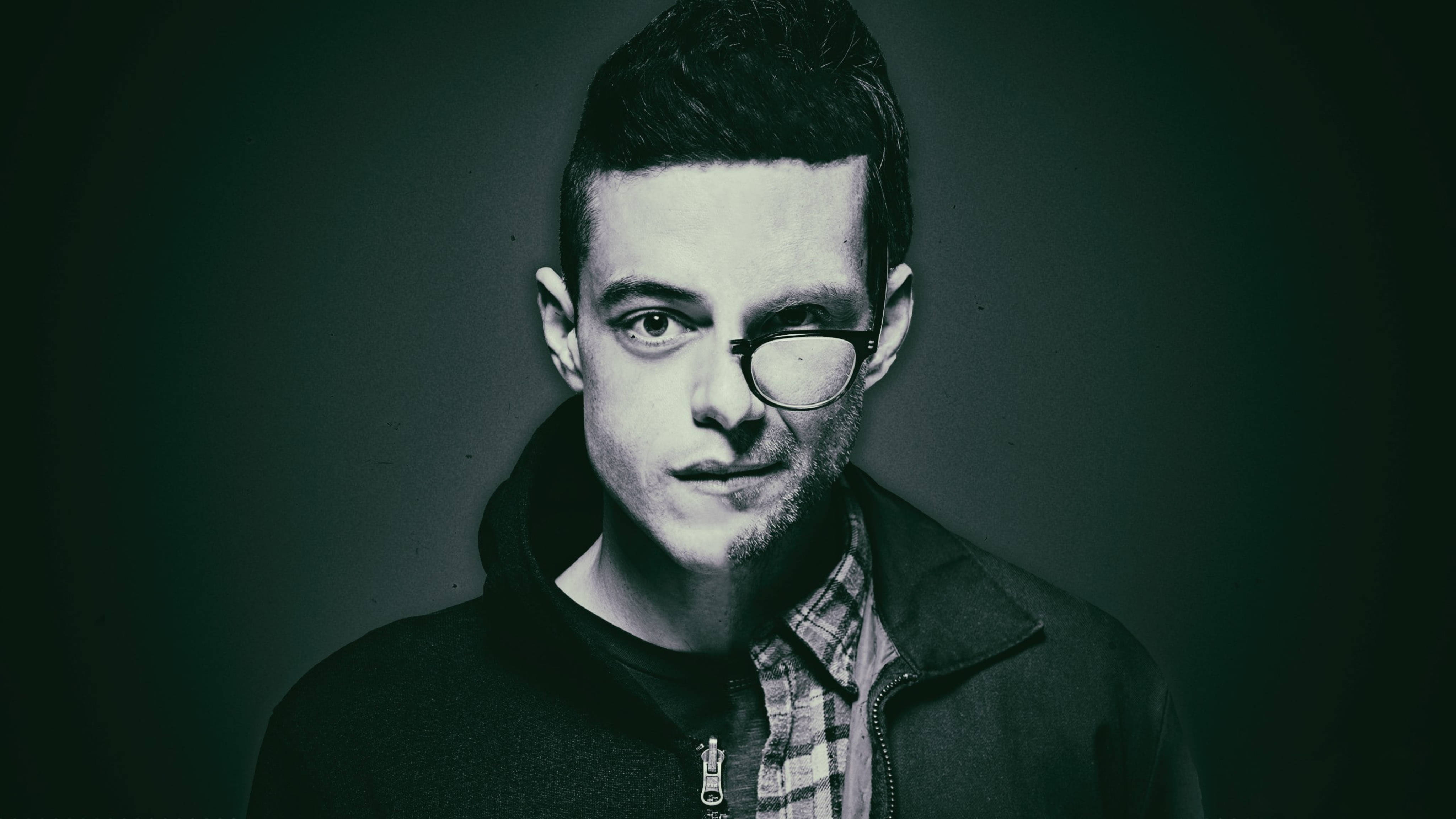 艾略特與 Mr. Robot 面部分離藝術 壁紙 — 一個戴眼鏡、留鬚根嘅年輕男子喺深色漸變背景前嘅憂鬱肖像。