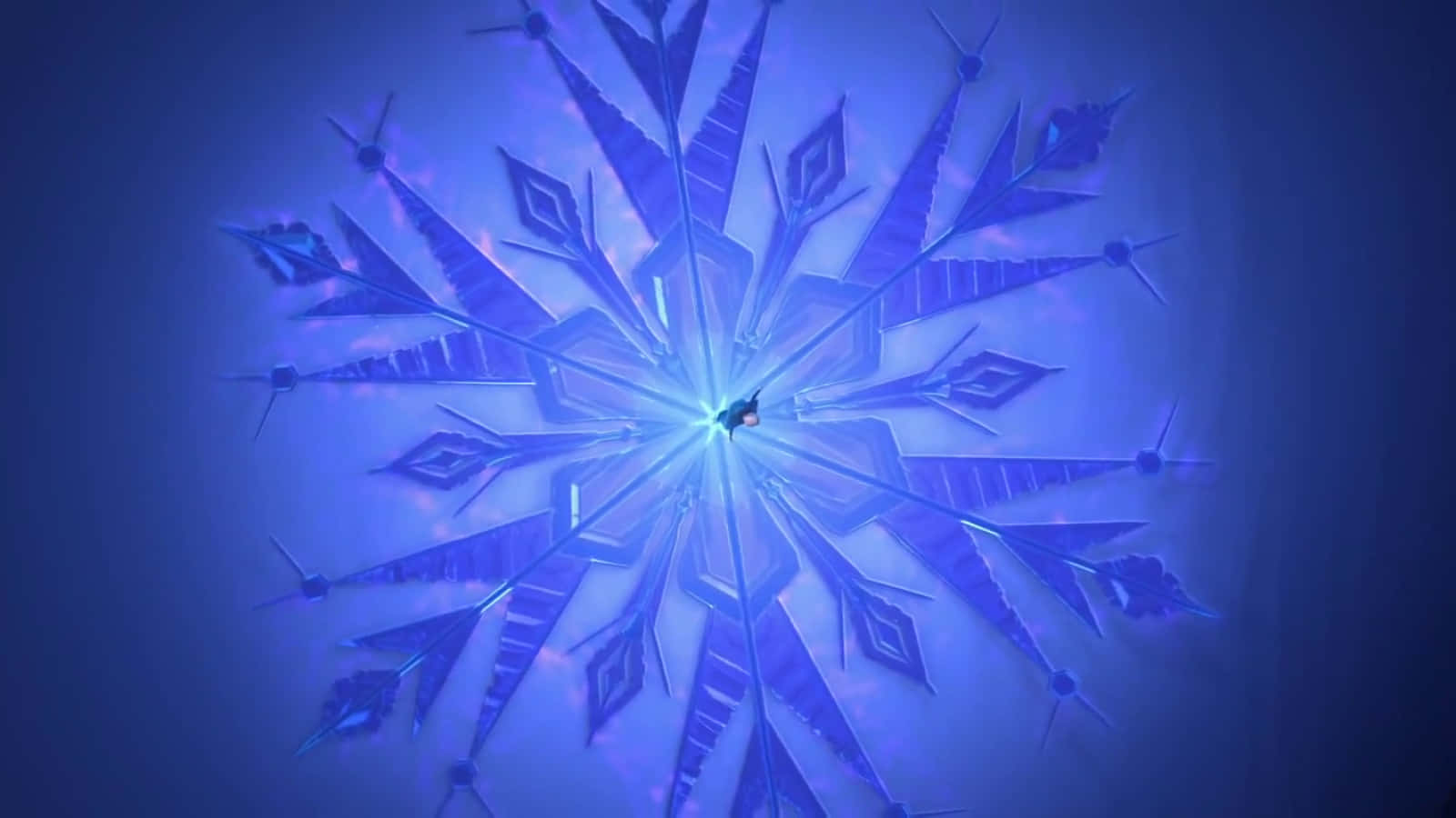 一個發光的藍色雪花，帶有從明亮中心輻射出的複雜幾何圖案。 — 冰雪奇緣 壁紙