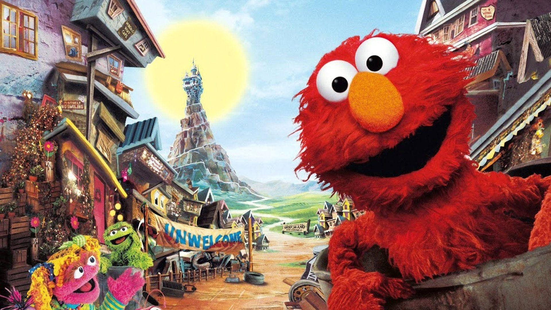 Elmo 和朋友們在陽光明媚的歡樂卡通村莊裡。