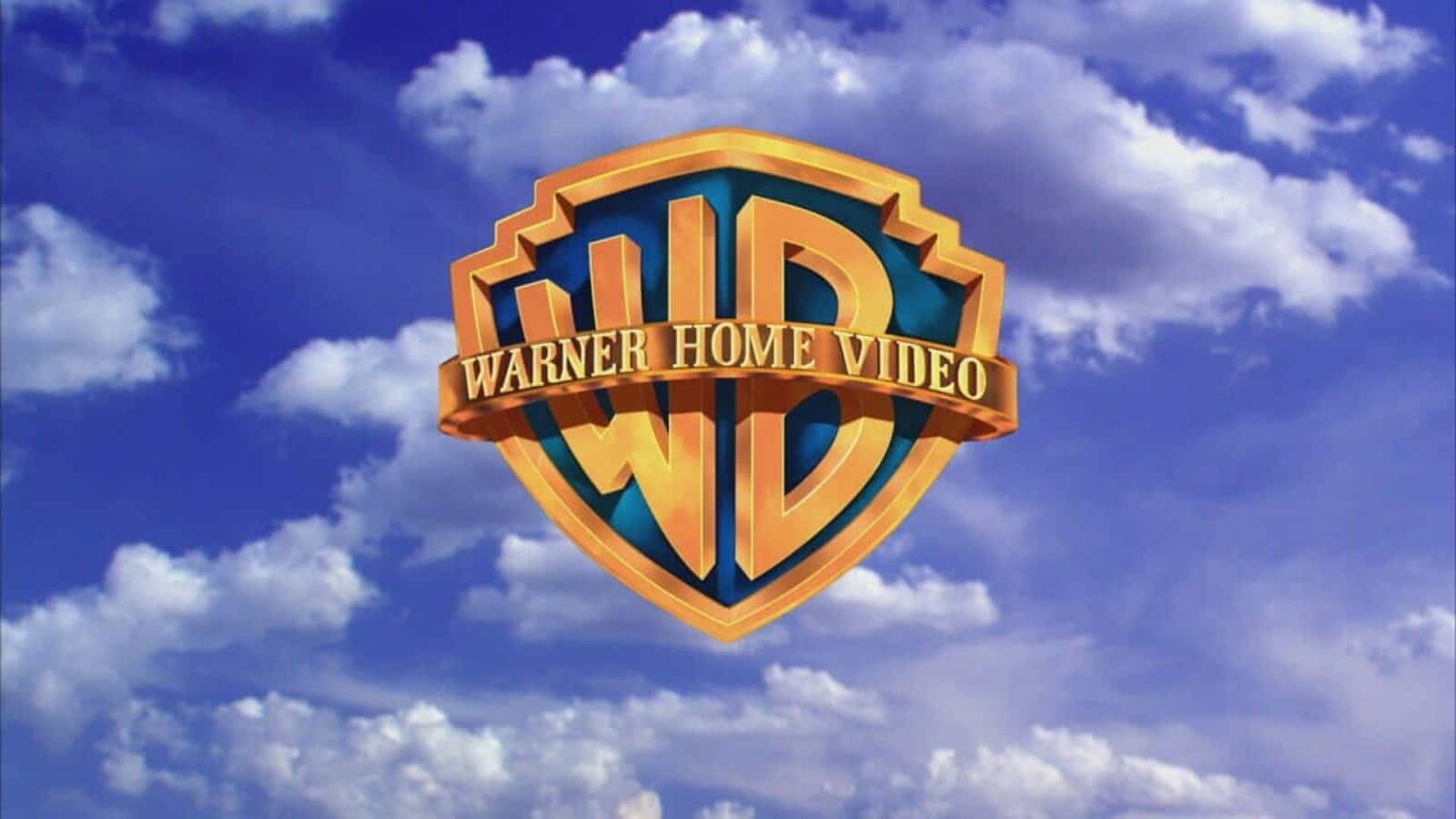 金色嘅 Warner Home Video 標誌襯住藍天白雲。