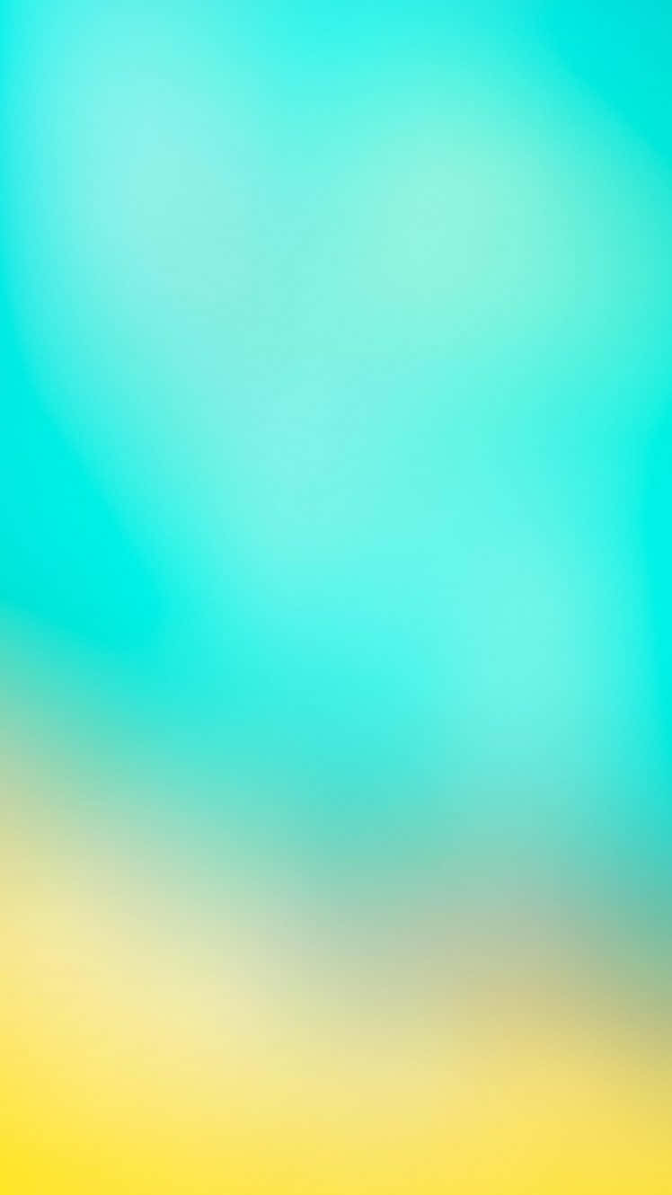 薄荷綠與淡黃色肖像背景 壁紙 — 柔和漸變混合青綠色和黃色，營造出平靜的抽象背景。