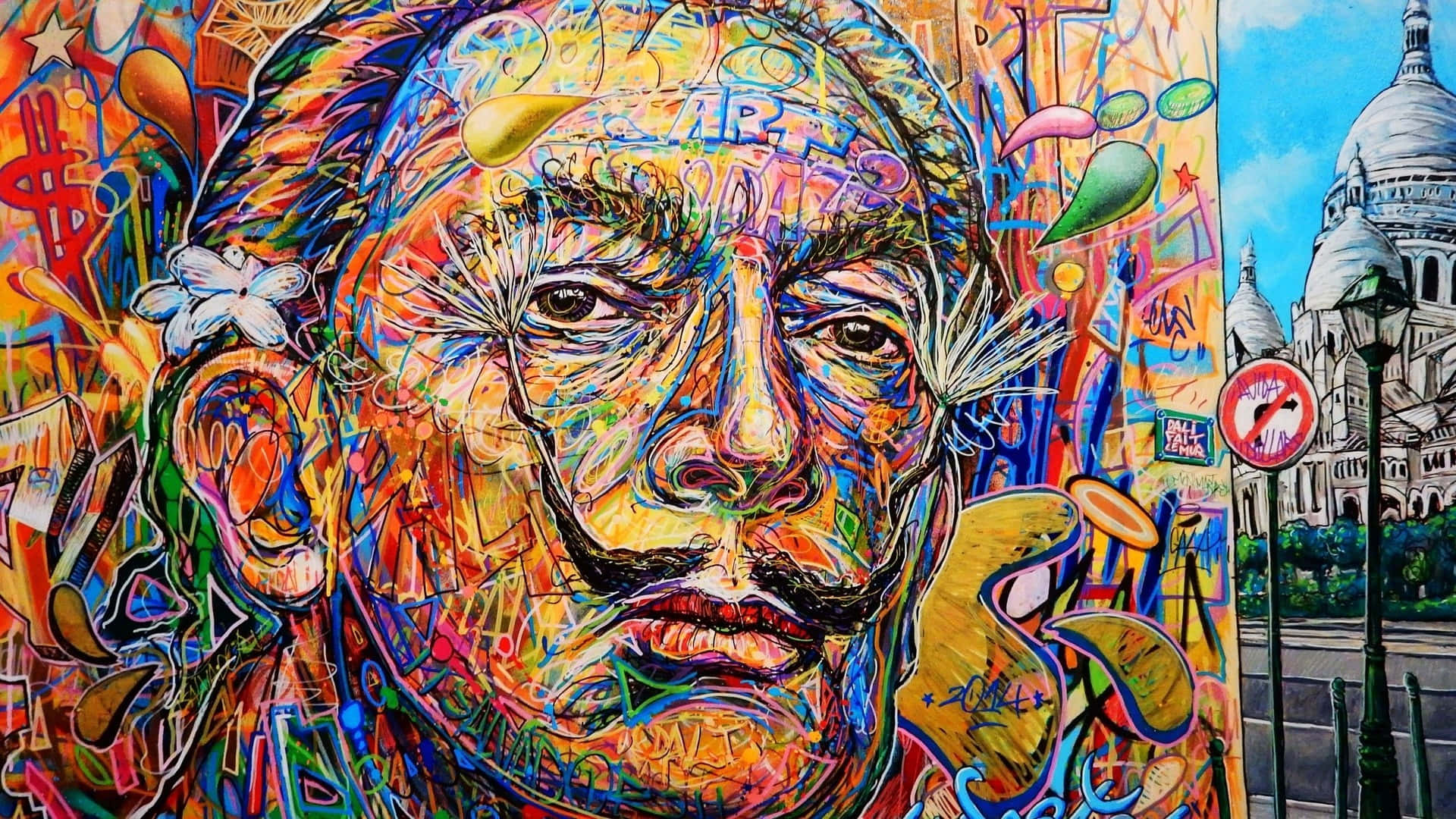 一幅色彩繽紛的塗鴉壁畫，描繪一個帶有蒲公英絨毛的男人面孔，旁邊是巴黎街景。
