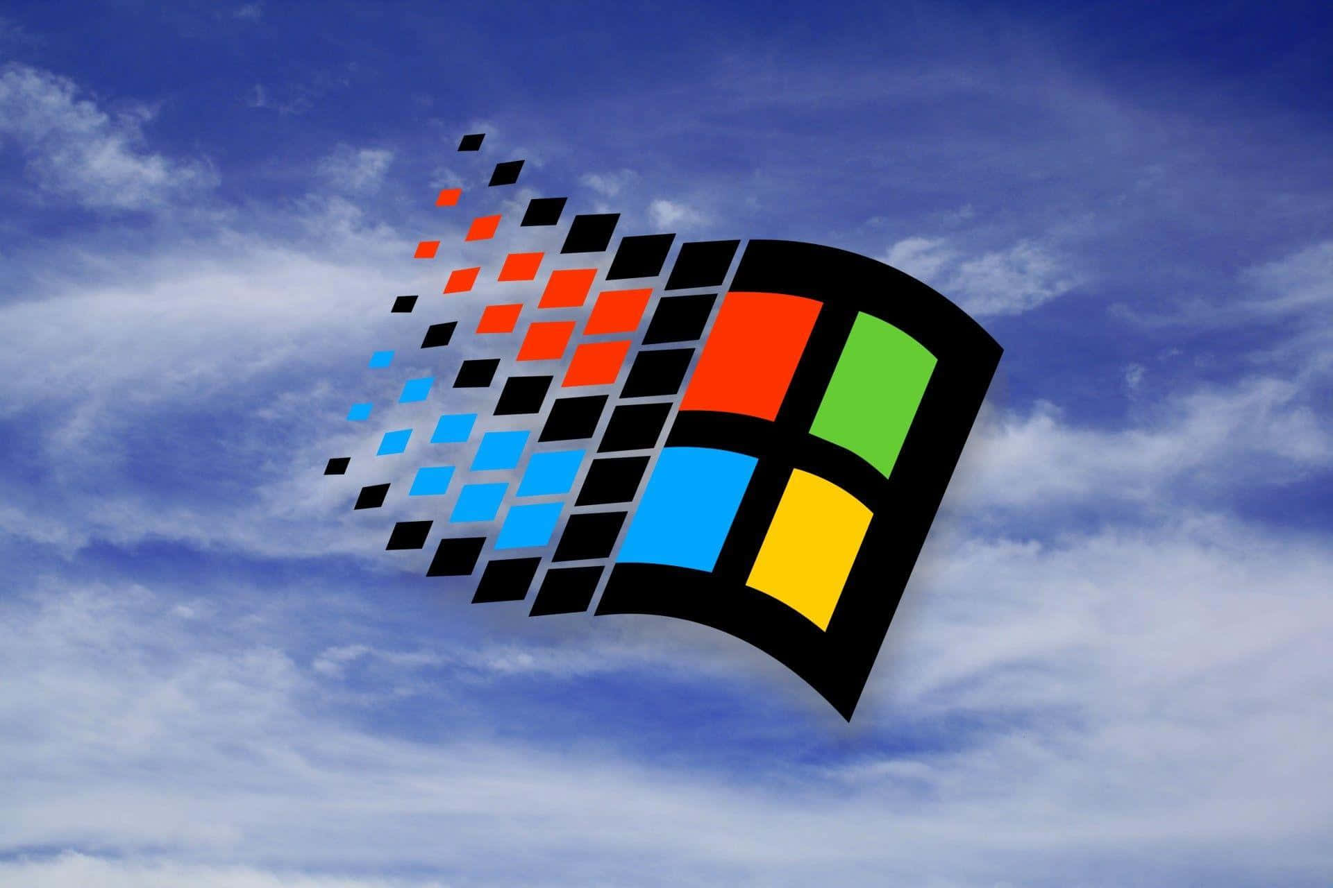 藍天配上色彩繽紛的Microsoft標誌 壁紙