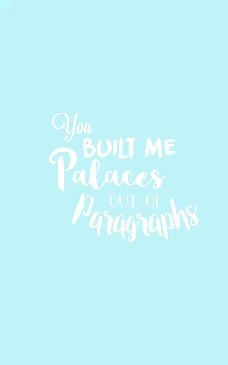文字引用：在薄荷色背景上以白色寫著 You Built Me Palaces Out of Paragraphs