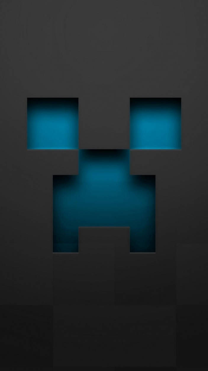 在深灰色背景上，一個像素化Minecraft苦力怕的發光藍色眼睛和嘴巴。