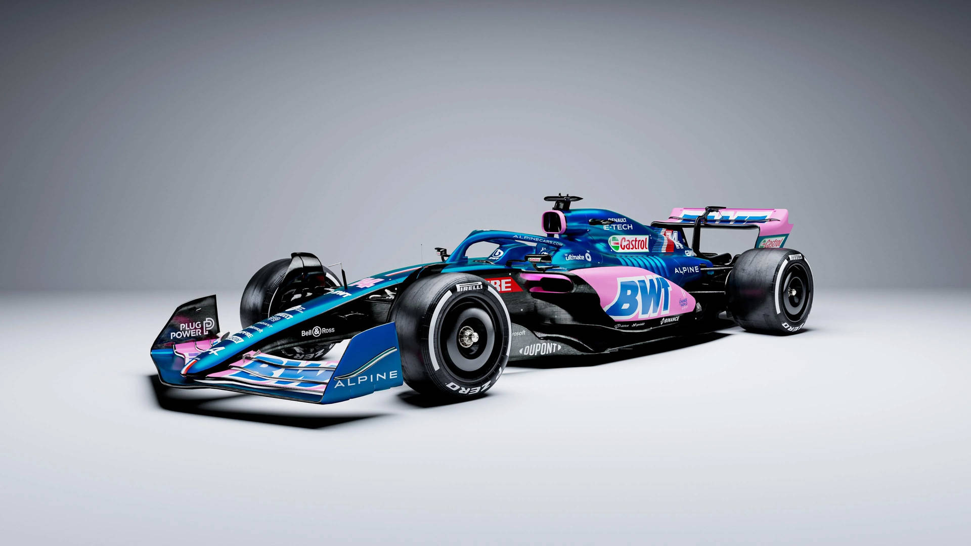 灰色工作室地板上的藍粉配色Alpine F1賽車。