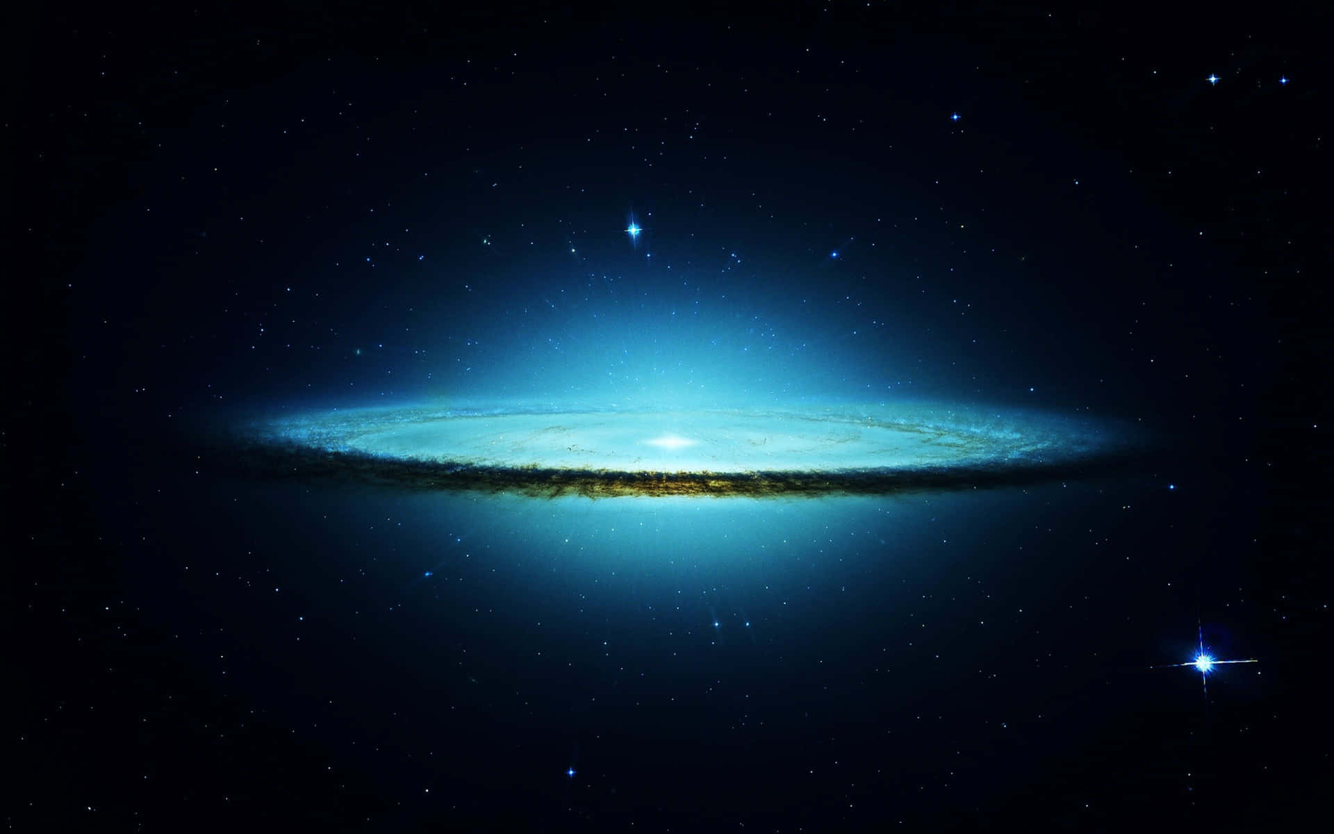 一個發光的螺旋星系，帶有藍色和金色的旋臂，被遙遠的星星包圍。
