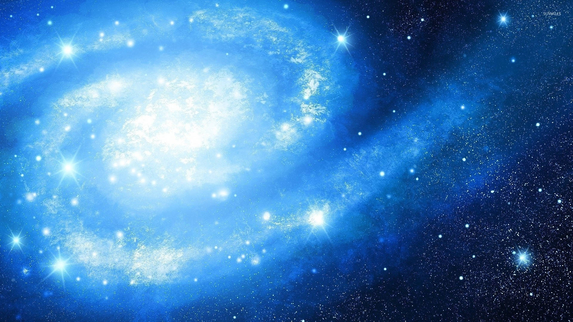 藍色太空星系 壁紙 — 一個發光的藍色螺旋星系，在深邃的宇宙背景下旋轉著明亮的星星。