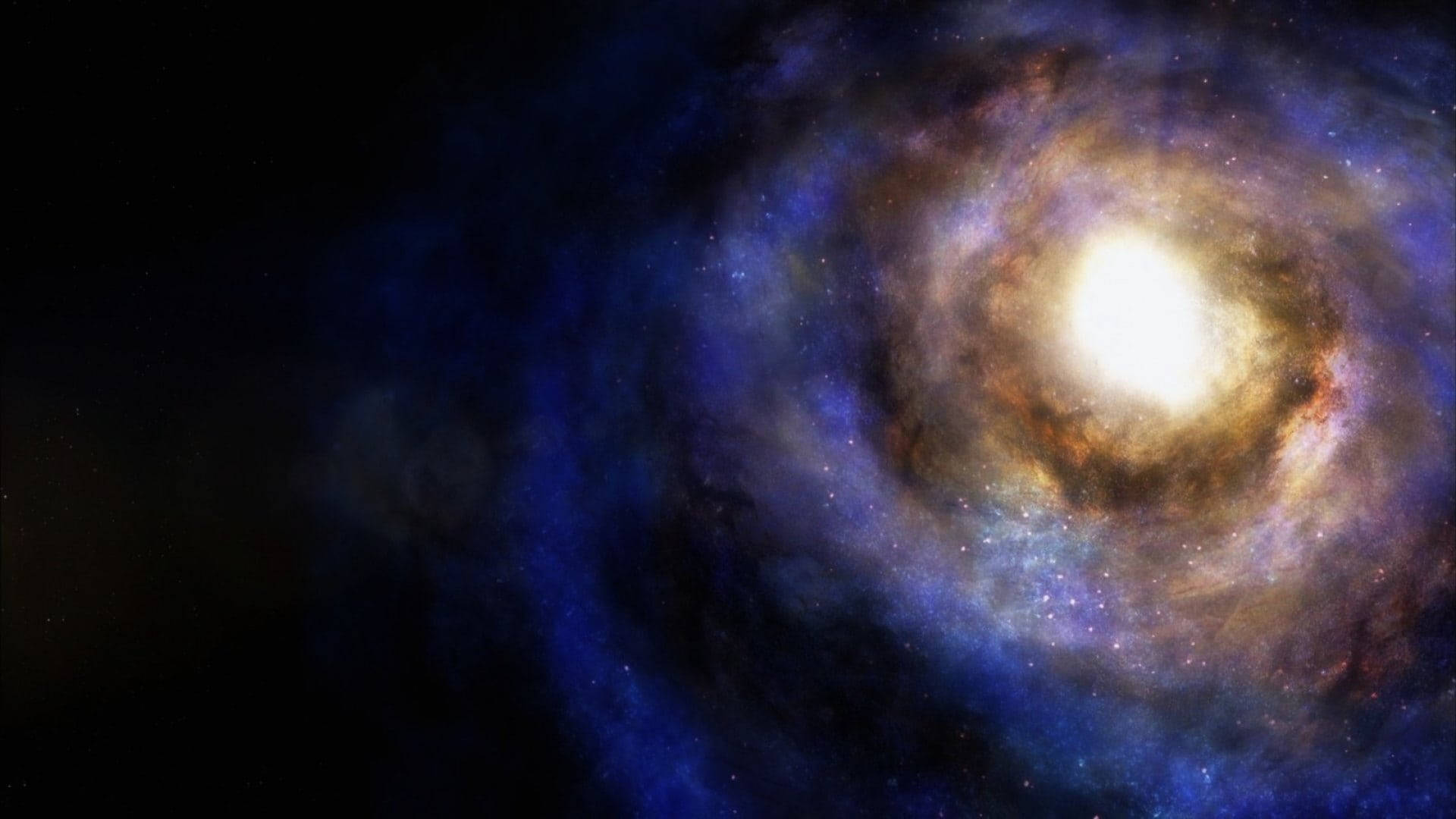 深空中帶有發光核心和藍色星雲的螺旋星系。