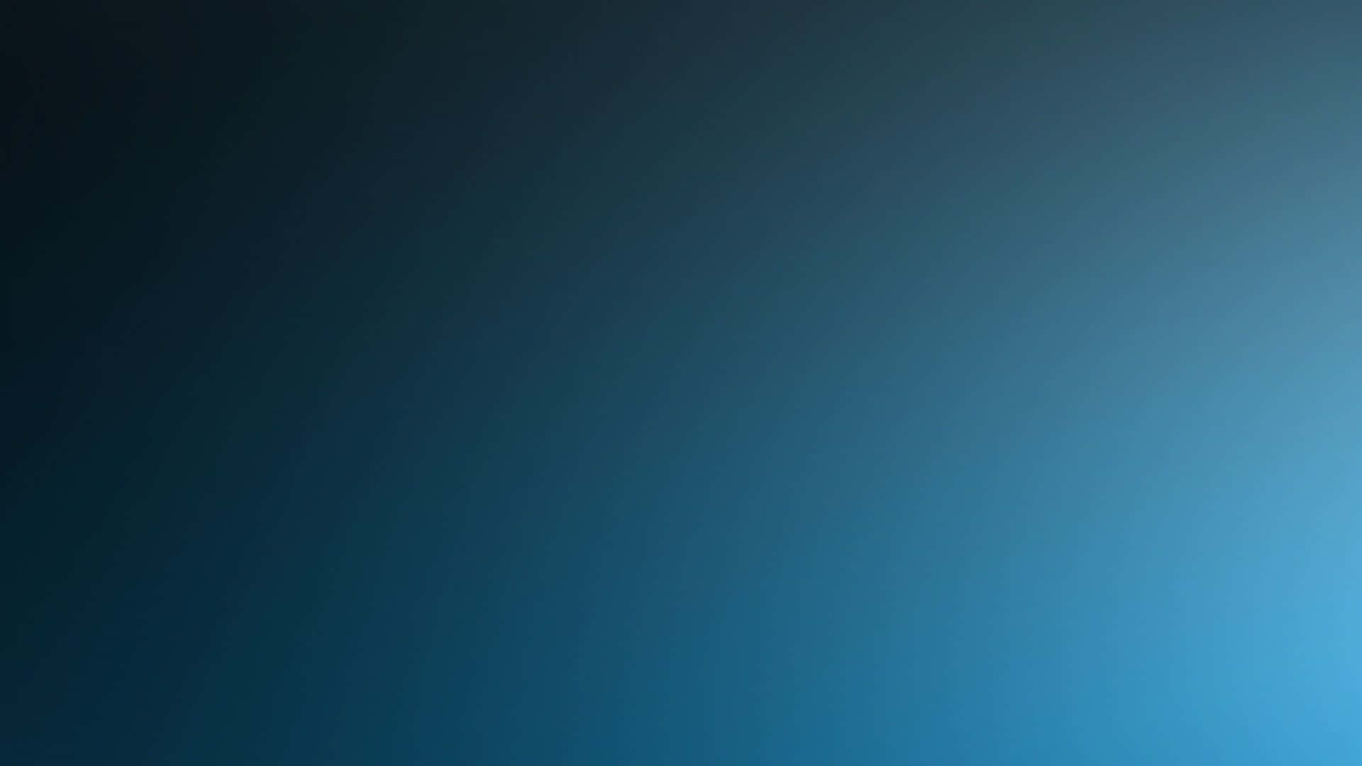 藍色漸層 GFX 背景 壁紙 — 整個畫面由深海軍藍過渡到亮青色，形成平滑漸變。