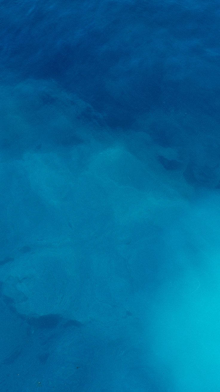 水下場景，帶有藍色水流和海床紋理。