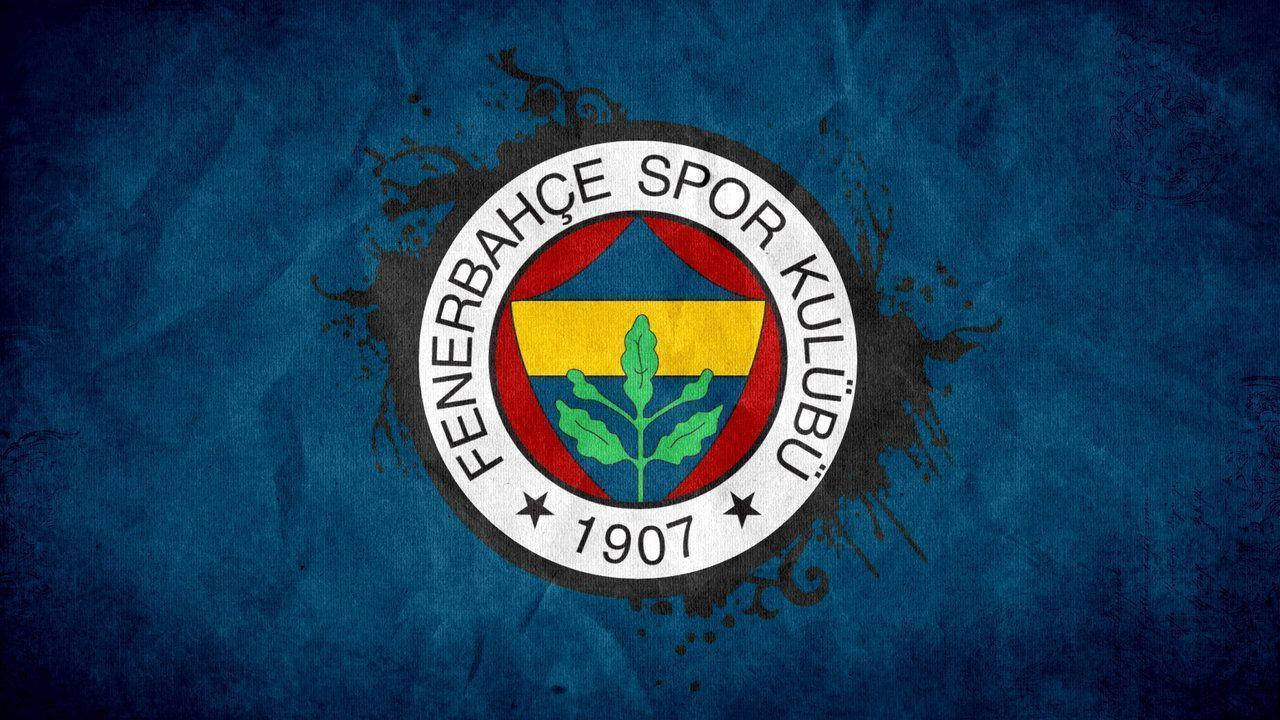 Fenerbahçe Spor Kulübü 足球會標誌，位於帶有黑色潑濺的紋理藍色背景上。