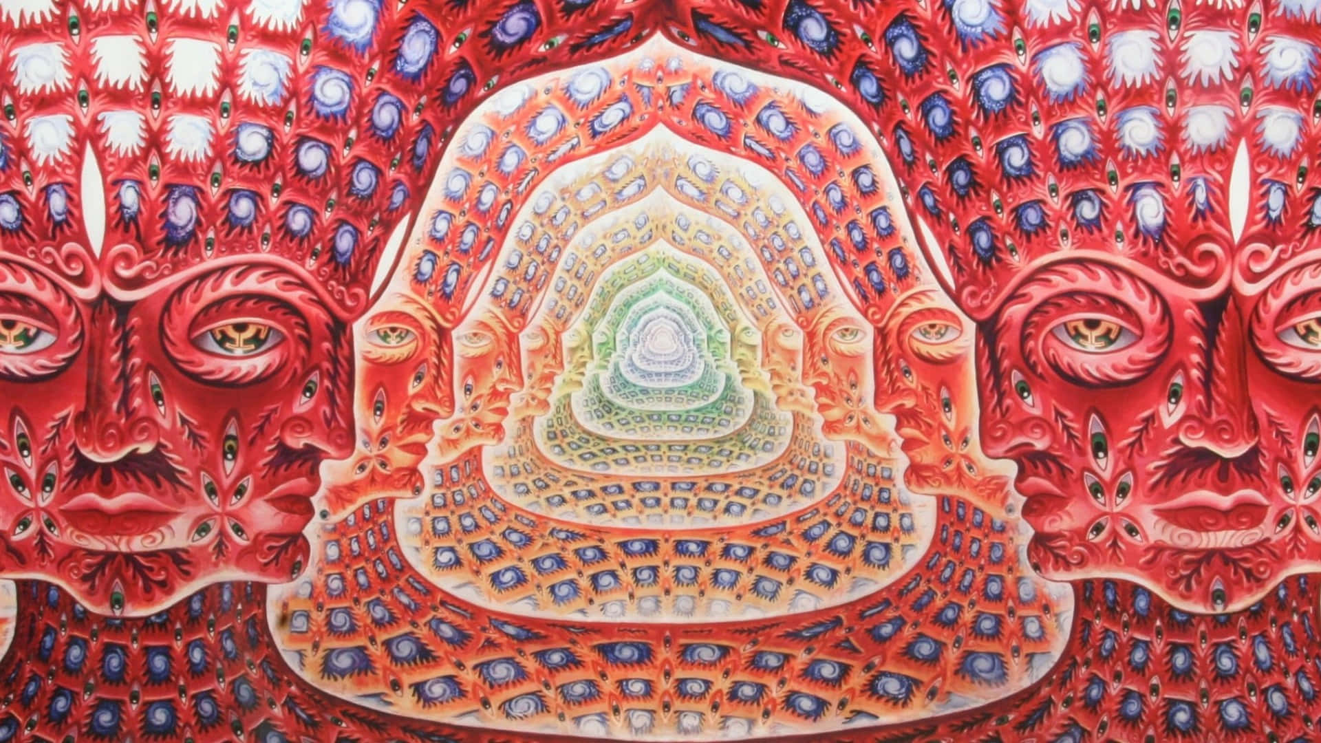 對稱的紅色面孔和眼睛框住一個色彩繽紛的螺旋隧道。