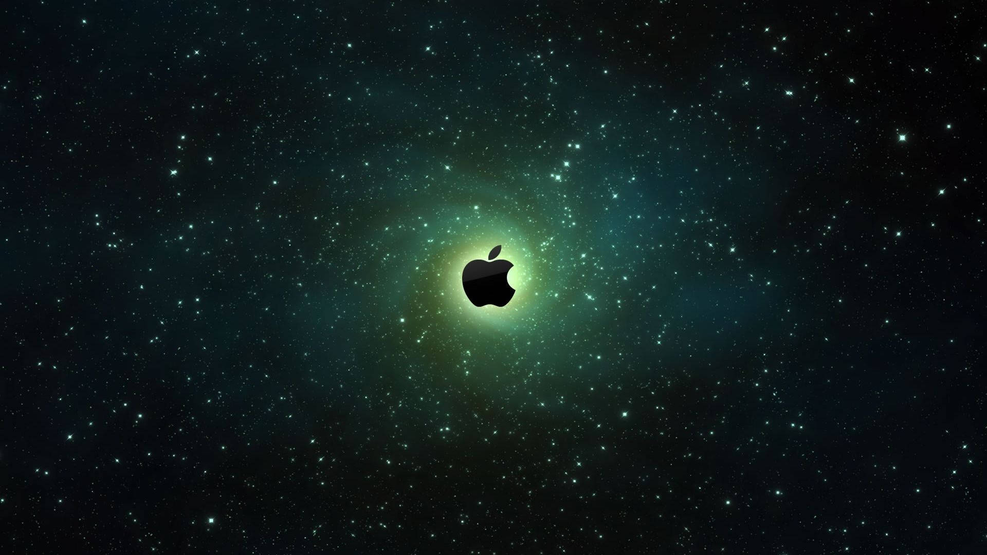 黑色Apple標誌在繁星點點的綠色星雲背景下發光。