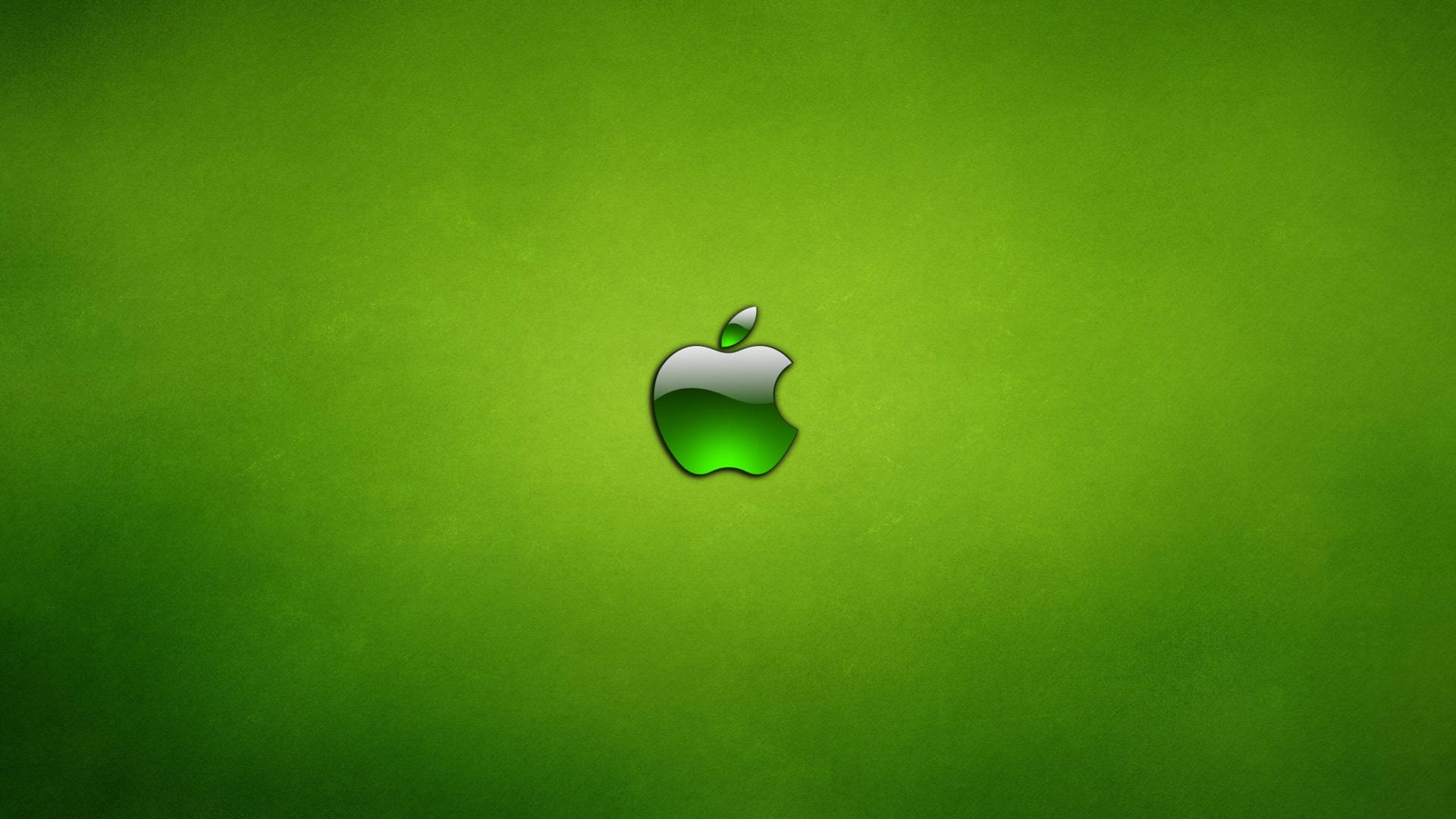 光澤Apple標誌在綠色紋理背景上