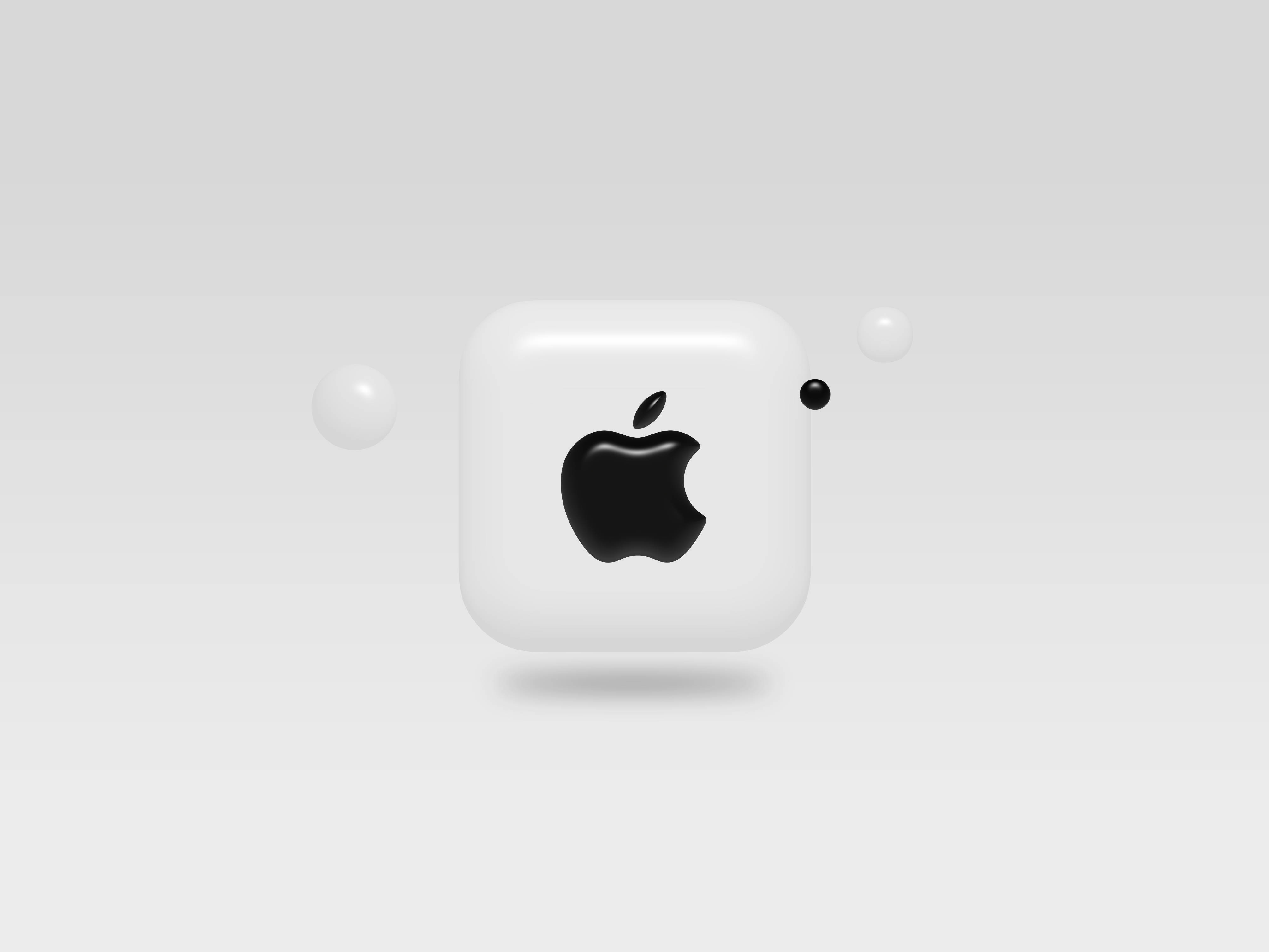 蘋果標誌3D筆記本電腦 壁紙 — 一個光滑的白色Apple AirPods保護殼，帶有黑色標誌，漂浮在極簡灰色漸變背景上。