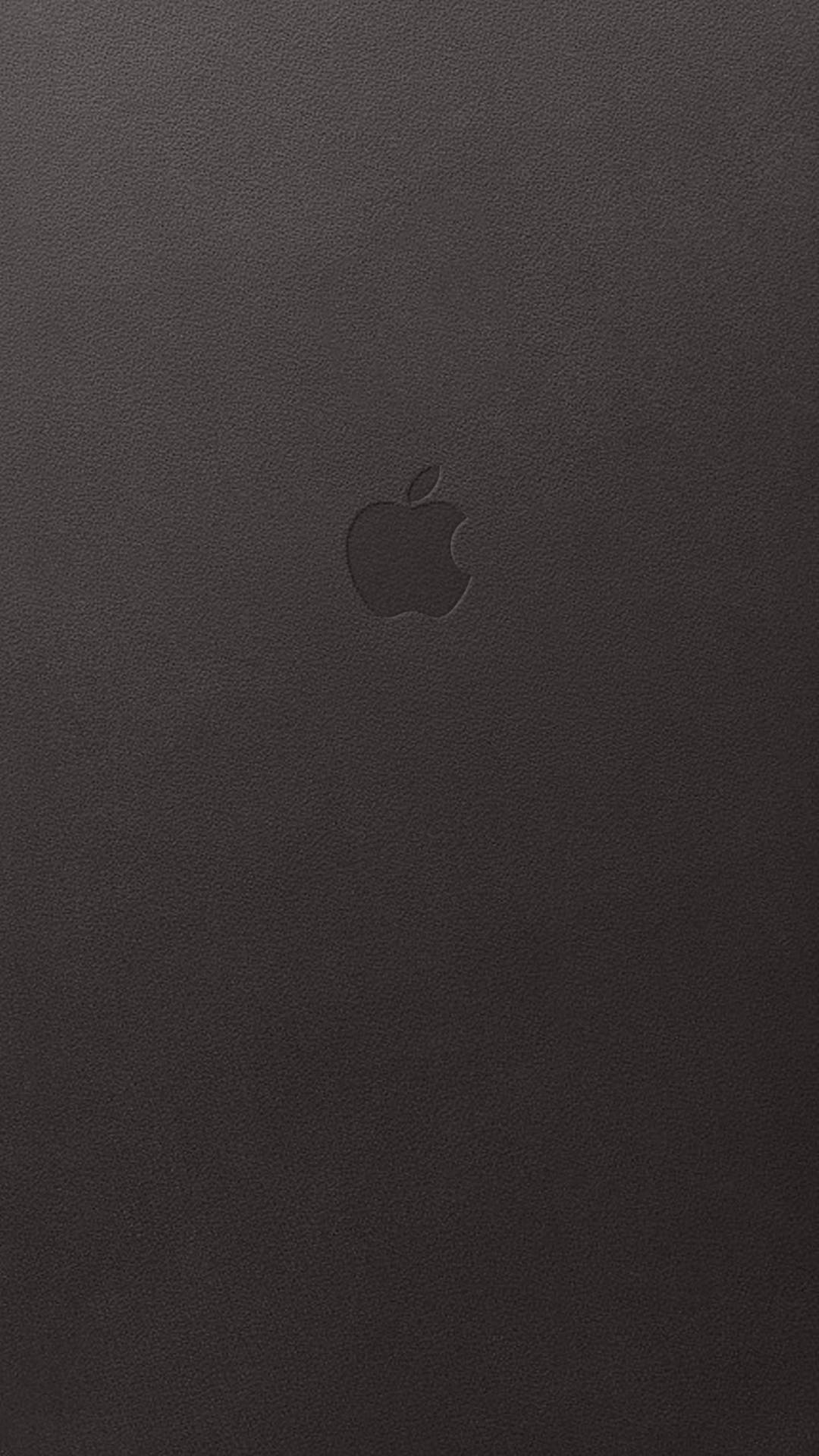 帶有壓印Apple標誌的黑色皮革表面