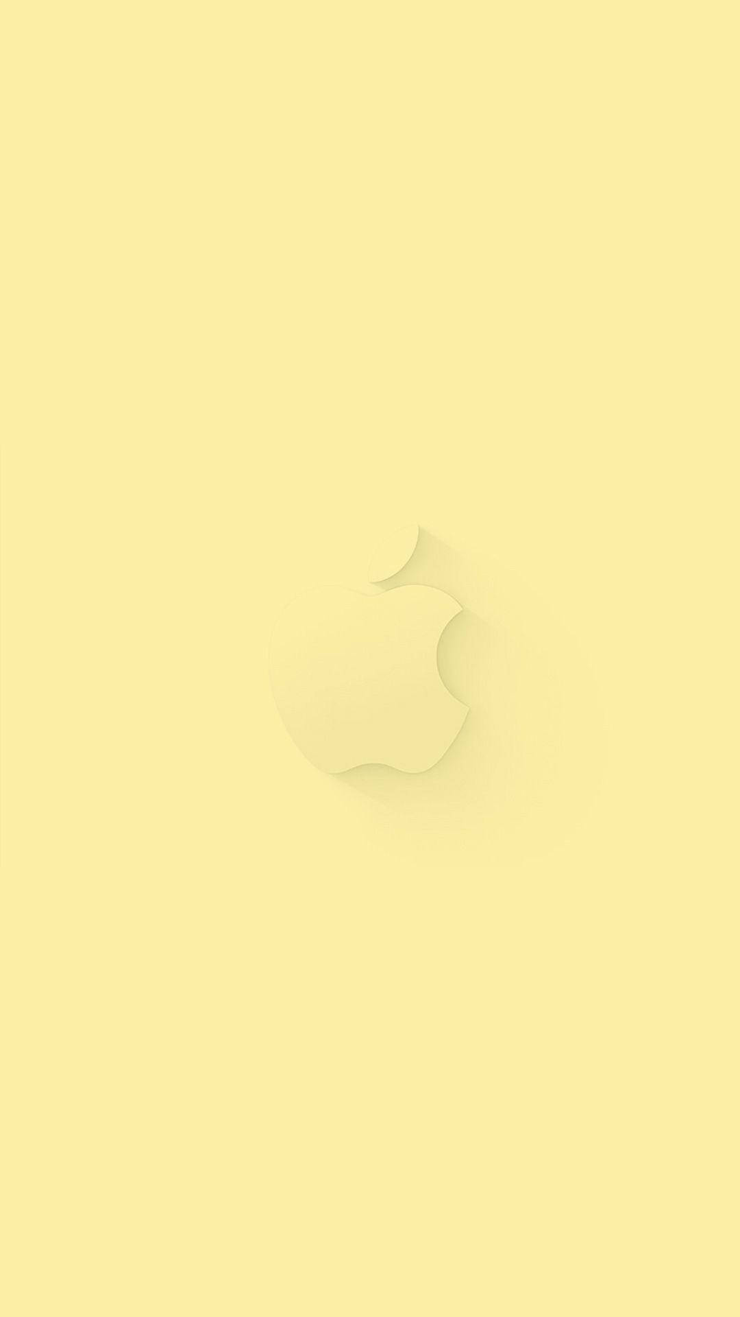 Apple標誌置中於淡黃色極簡背景上