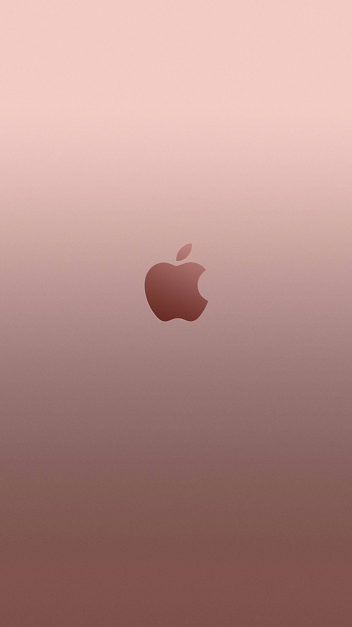 蘋果標誌玫瑰金 iPhone 壁紙 — 一個極簡的玫瑰金漸變背景，中央有一個帶咬痕和葉子的Apple標誌。